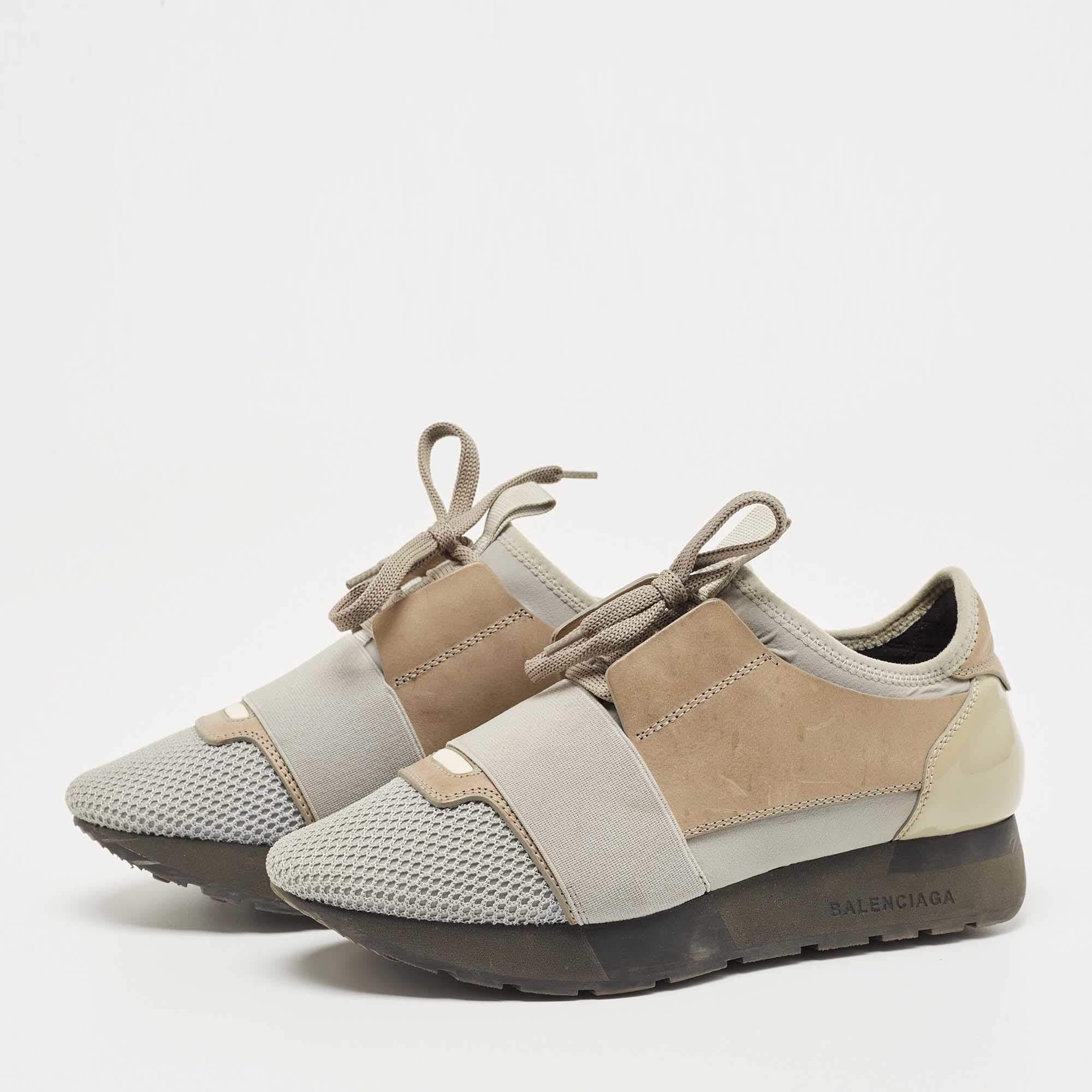 Let your latest addition be this pair of Race Runners sneakers from Balenciaga. Its exterior is crafted using leather as well as mesh with covered toes, strap detailing on the vamps, and lace-up fastenings. This pair is completed with a