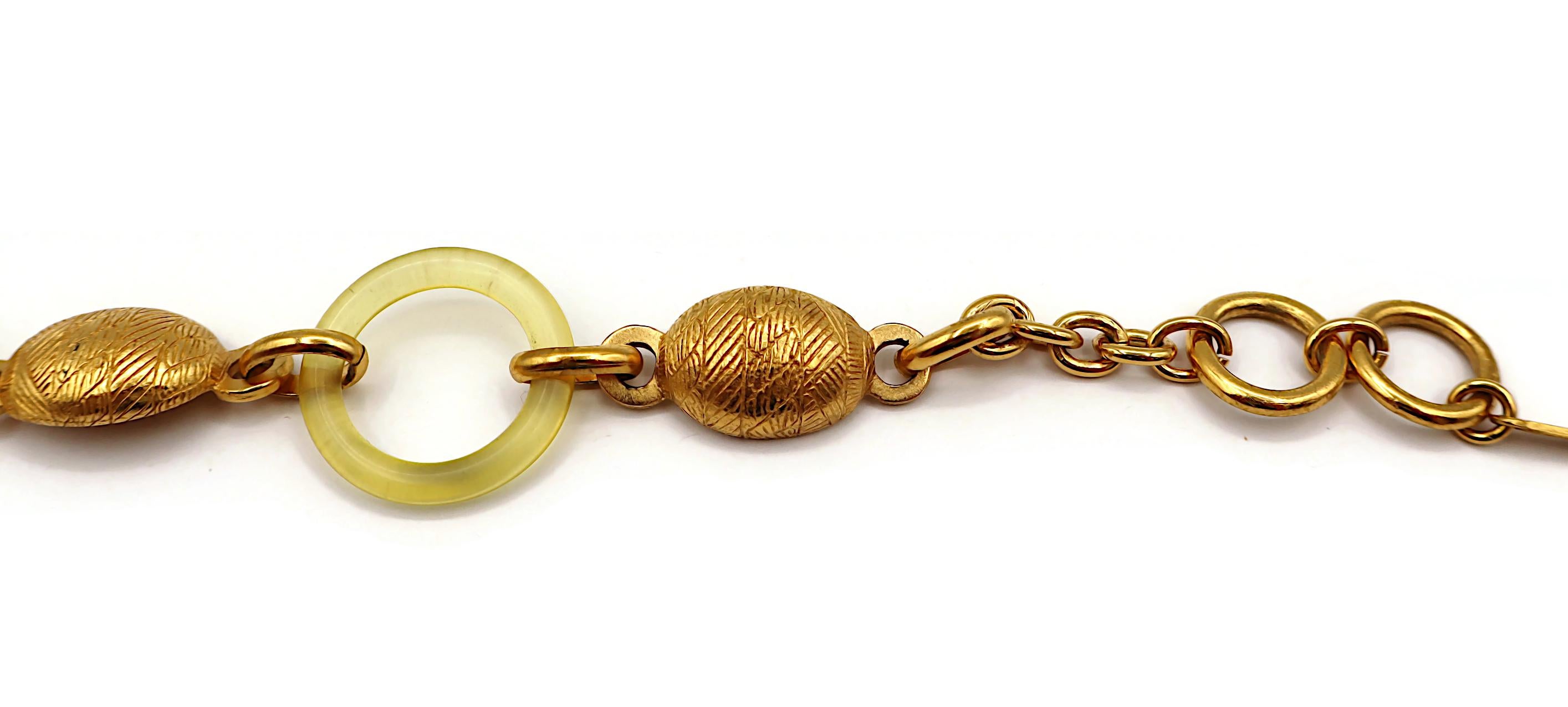 BALENCIAGA Vintage Gold Tone and Resin African Tribal Motif Pendant Necklace For Sale 10