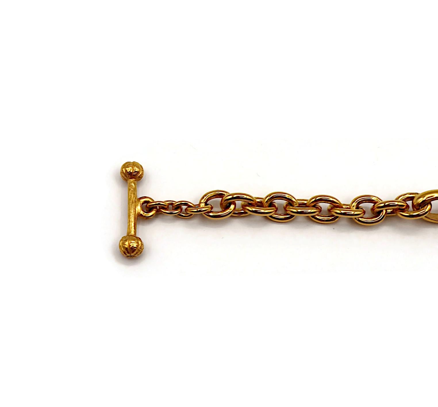 Women's BALENCIAGA Vintage Gold Tone and Resin African Tribal Motif Pendant Necklace For Sale