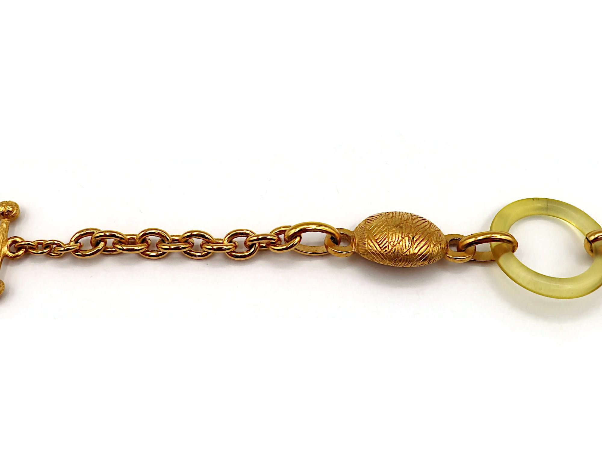 BALENCIAGA Vintage Gold Tone and Resin African Tribal Motif Pendant Necklace For Sale 1