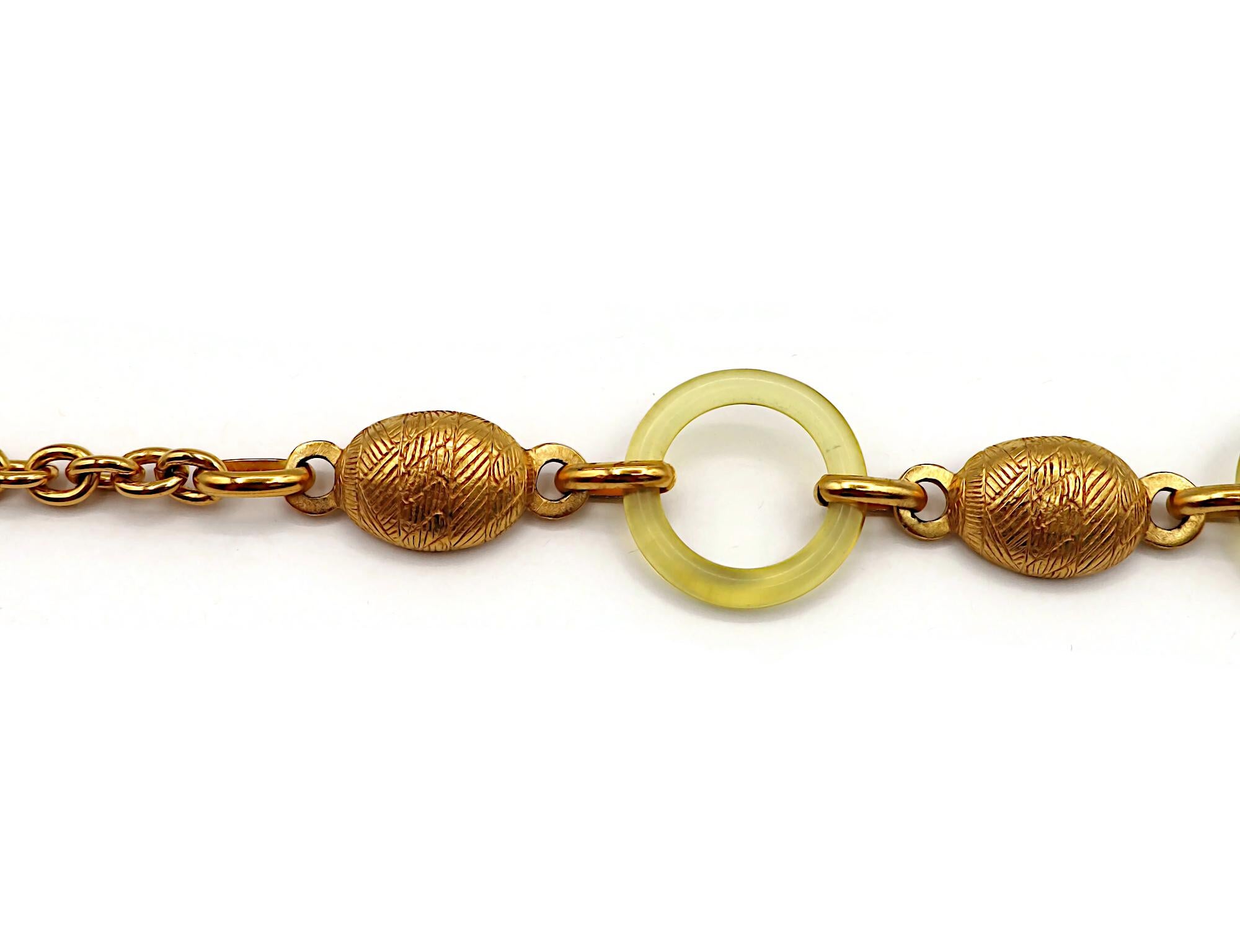 BALENCIAGA Vintage Gold Tone and Resin African Tribal Motif Pendant Necklace For Sale 2