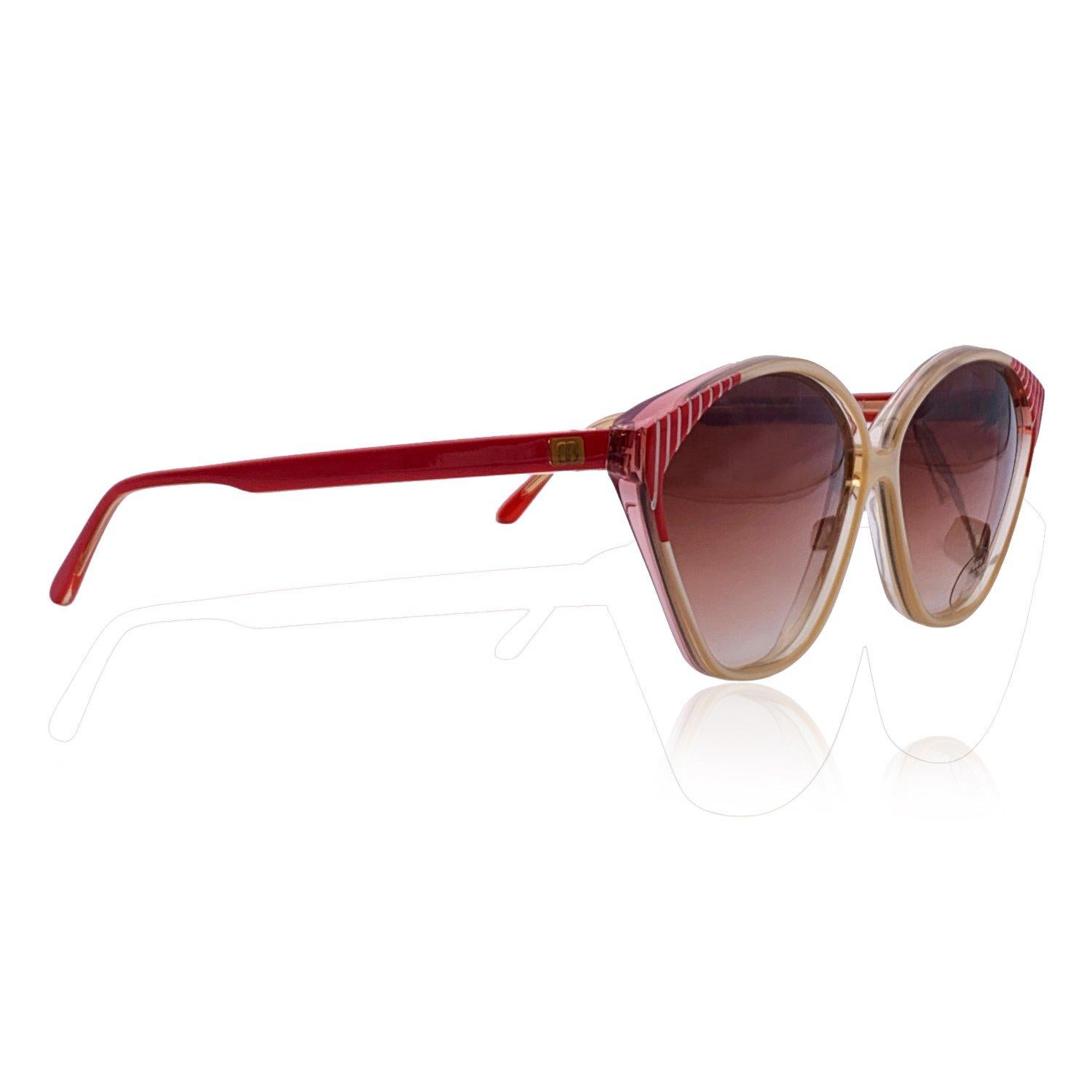 Vintage Balenciaga sunglasses mod. 2403.Red and white acetate frame. Logo on temples. Original 100% Total UVA/UVB protection in gradient brown color. Made in France Details MATERIAL: Acetate COLOR: Red MODEL: 2403 GENDER: Women COUNTRY OF