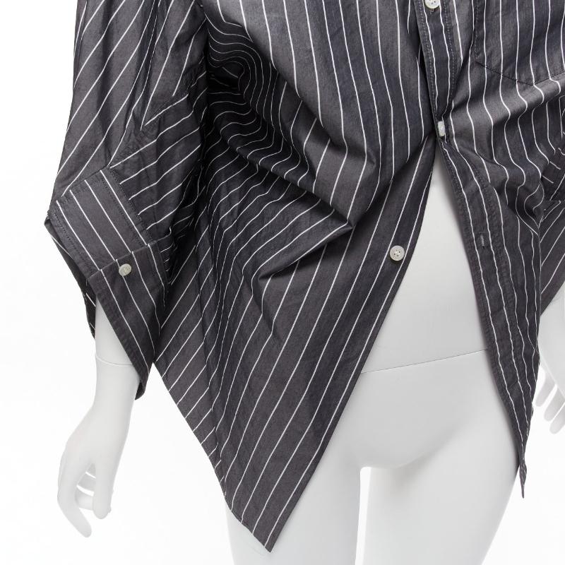 BALENCIAGA Wardrobe Demna 2021 grey pinstripe embroidered logo deconstructed shirt FR34 XS
Reference: TGAS/D00756
Brand: Balenciaga
Designer: Demna
Material: Feels like cotton
Color: Grey, White
Pattern: Pinstriped
Closure: Button
Extra Details: