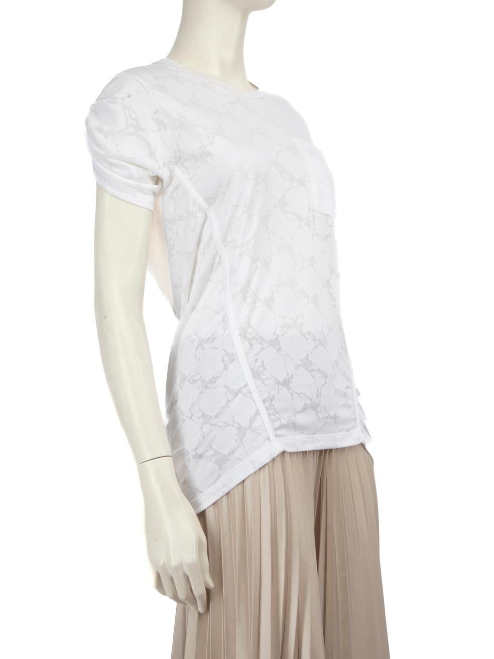 CONDITION is Very good. Minimal wear to the t-shirt is evident. Light signs of wear to the back neckline with small discoloured marks. Plucks to the weave on the hem of this used Balenciaga designer resale item.
  
  Details
  
  
  White 
  
 
