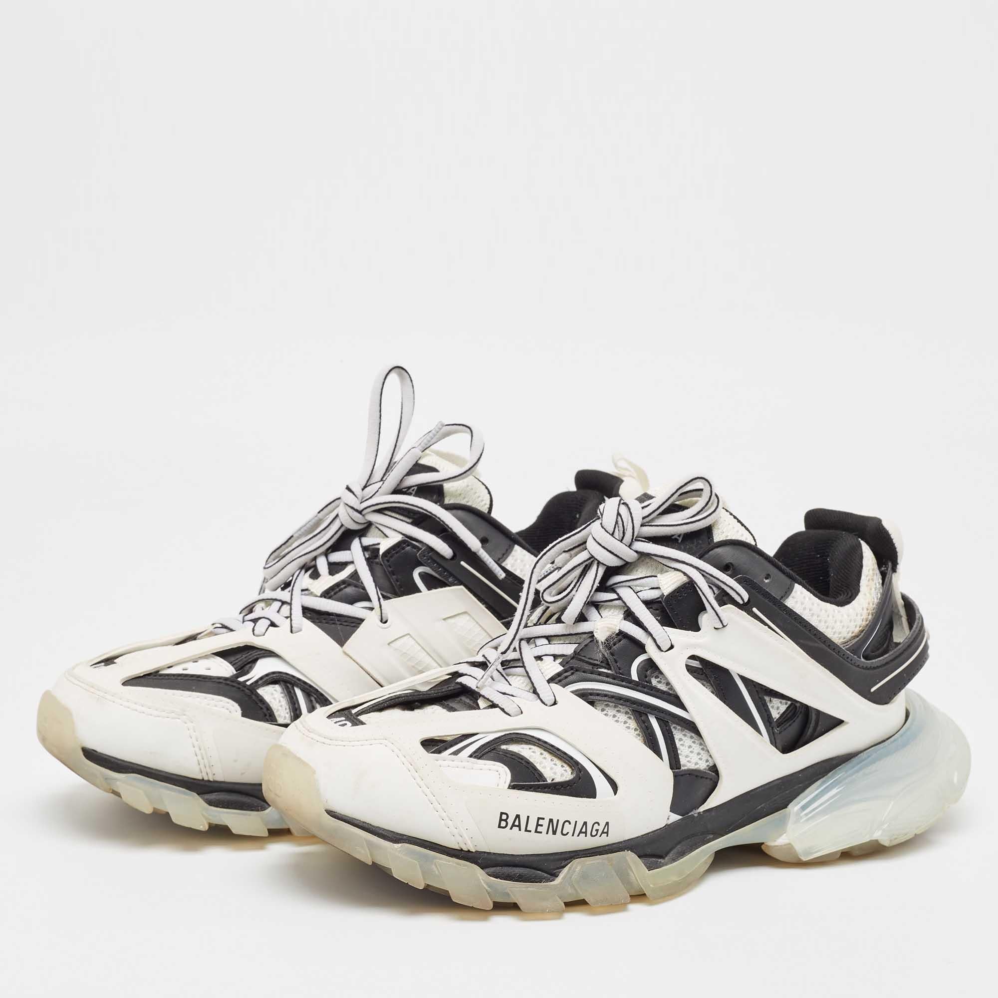 Coming in a classic silhouette these designer sneakers are a seamless combination of luxury comfort and style. These sneakers are finished with signature details and comfortable insoles.