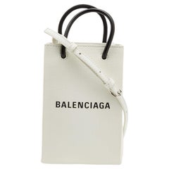 Balenciaga - Sac à bandoulière en cuir blanc/noir North South