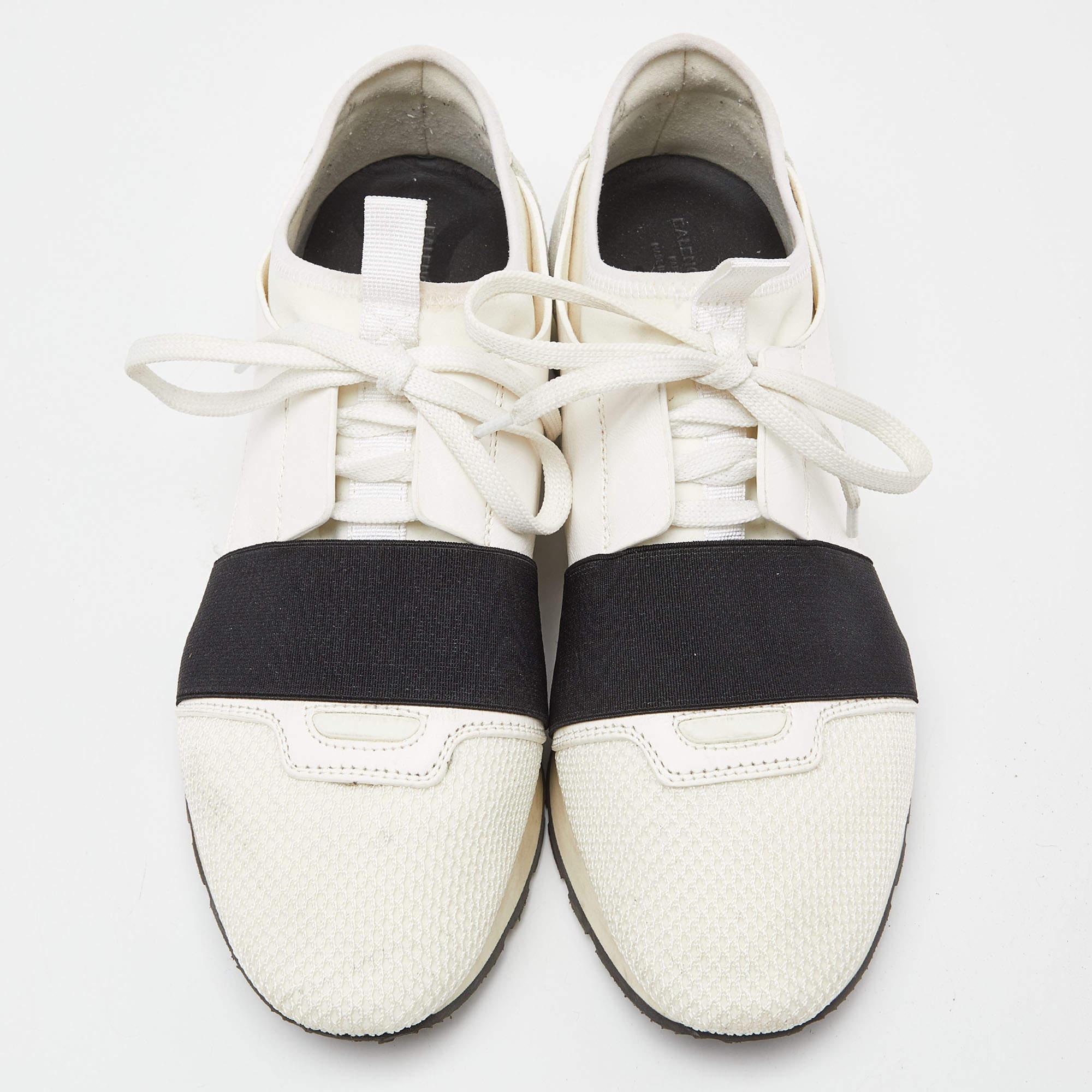 Let your latest addition be this pair of Race Runners sneakers from Balenciaga. Its exterior is crafted using leather as well as mesh with covered toes, strap detailing on the vamps, and lace-up fastenings. This pair is completed with a