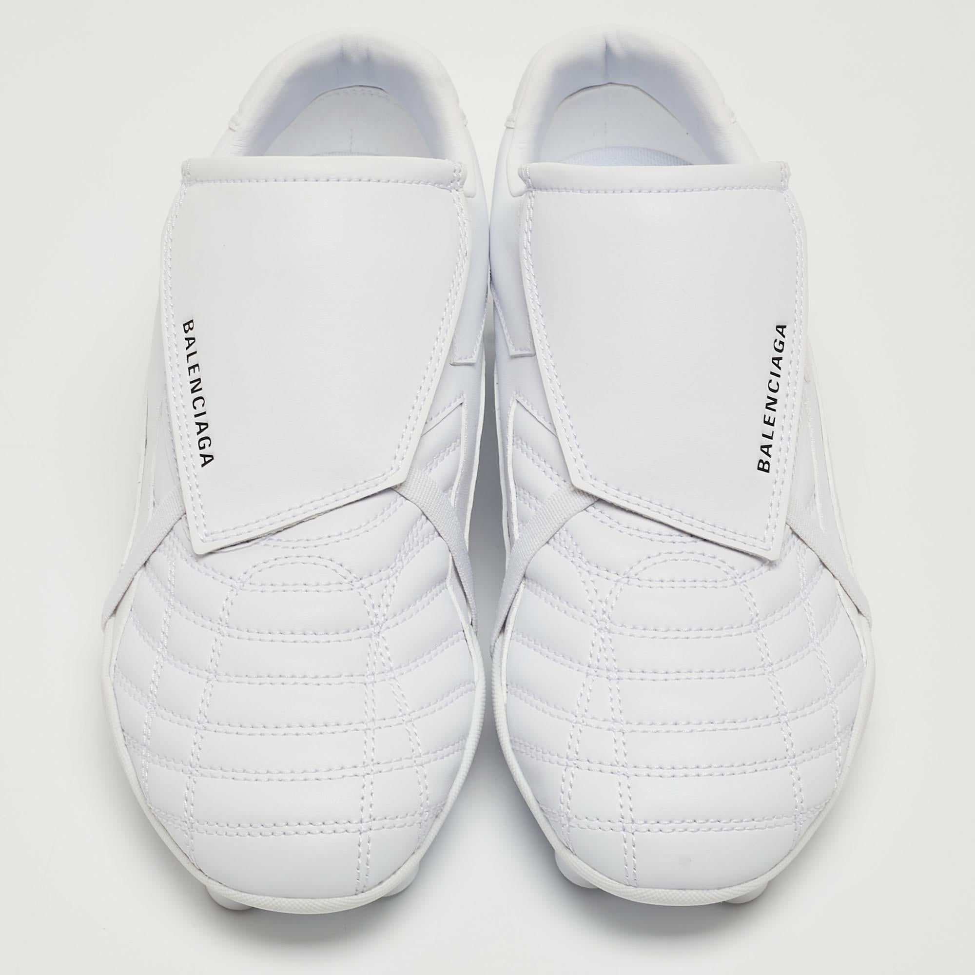 Elevate your casual attire with Balenciaga's sneakers. Crafted with precision from high-quality faux leather, these sneakers exude contemporary charm. The clean white hue adds versatility, while the soccer-inspired design offers a sporty edge.