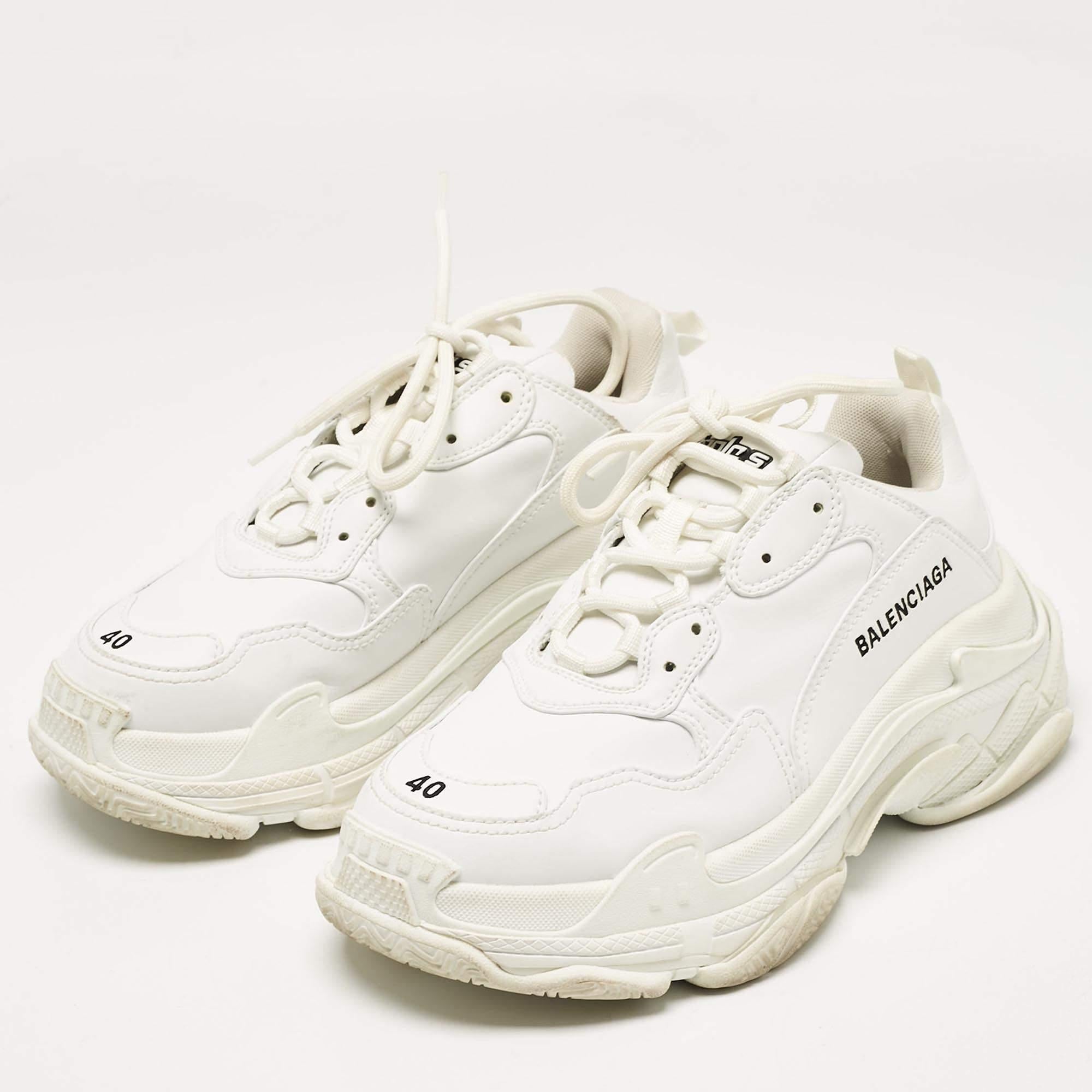 With durable construction  these Balenciaga sneakers will lend you a stylish modern look. The rubber soles of this pair will provide you with optimum grip while walking. Made from faux leather  these shoes get a luxe update with a brand signature on