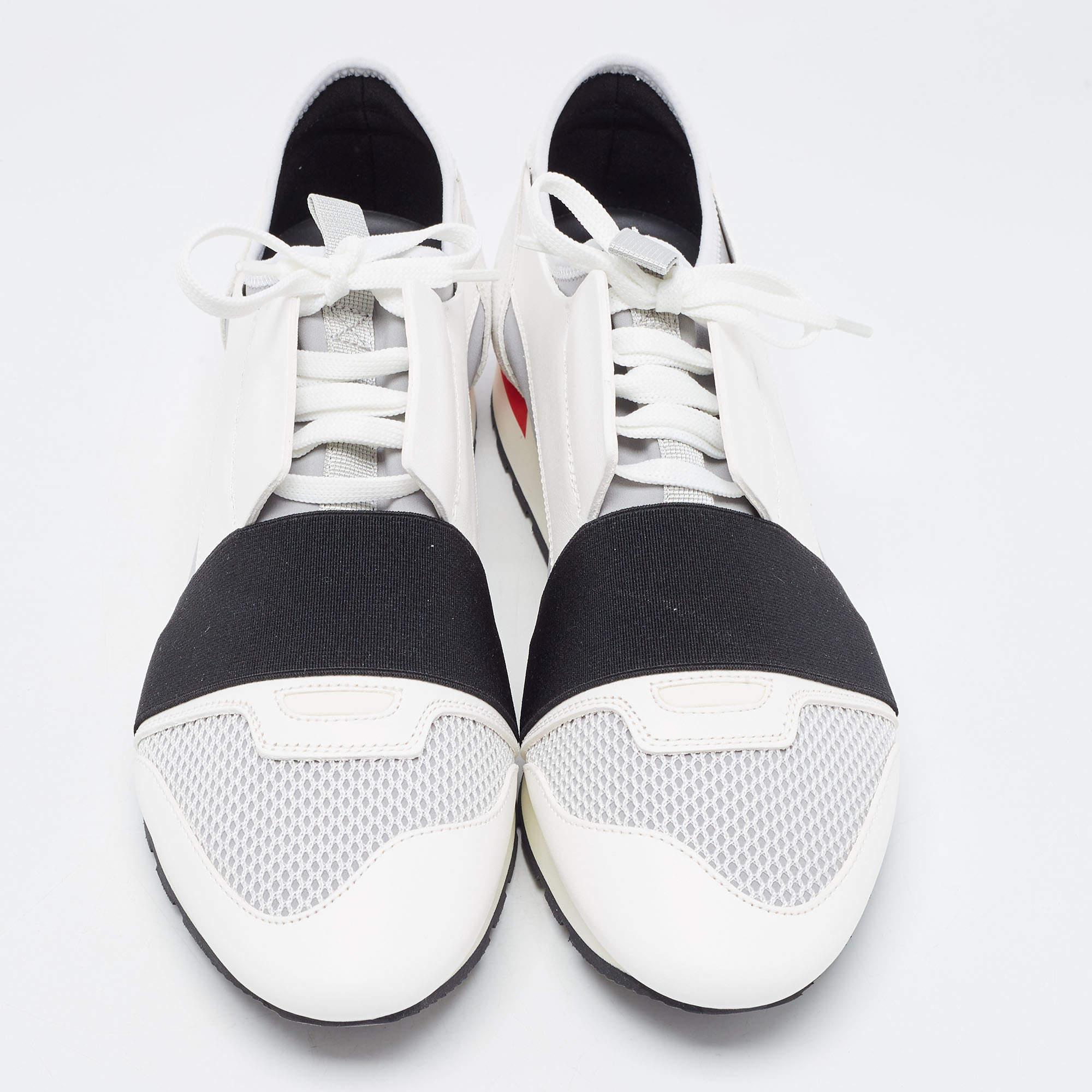 Let your latest addition be this pair of Race Runners sneakers from Balenciaga. Its exterior is crafted using leather as well as mesh with covered toes, strap detailing on the vamps, and lace-up fastenings. This pair is completed with a