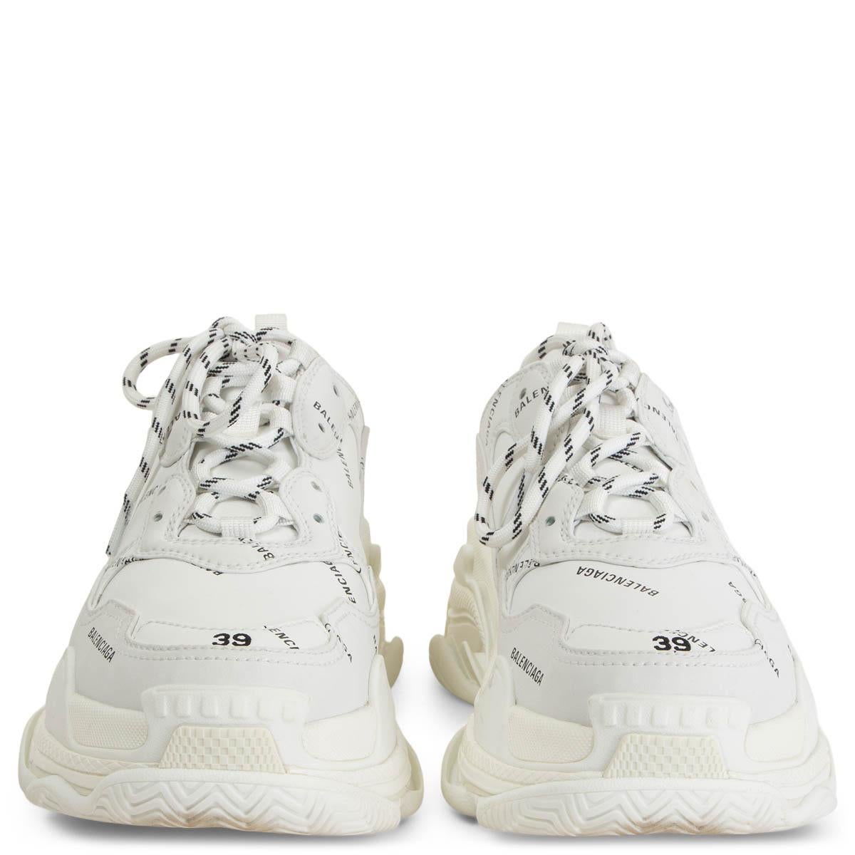 100% authentic Balenciaga All-Over Logo Triple S Sneaker in white faux leather, double foam and mesh. Allover logo printed. Embroidered size at the edge of the toe and embroidered logo on the side. Triple S rubber branding on the tongue. Back