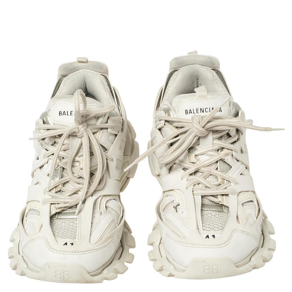 These Track Trainers sneakers from Balenciaga offer the correct amount of style and comfort. They have been crafted from leather, rubber, and mesh and designed in a chunky silhouette with panels, lace-up vamps, and the brand labels on the tongues.