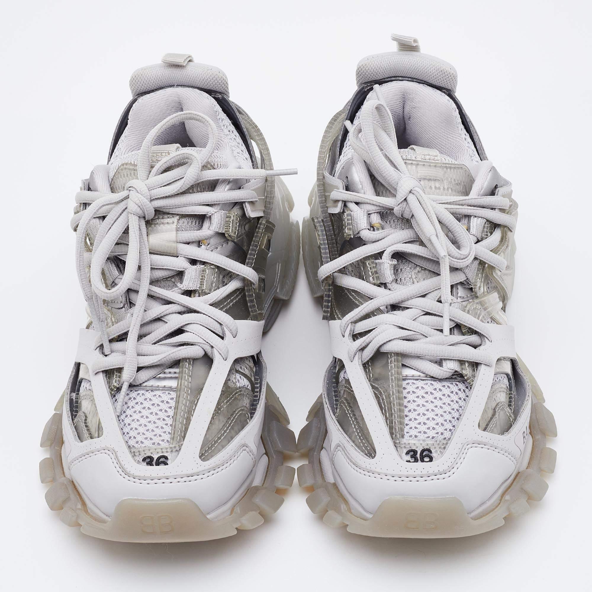 Featuring a mix of materials and double laces knotted on the uppers, these Balenciaga Track 2 sneakers are a dream to walk in. Label detailing and the size on the toes add the finishing touch.

Includes: Extra Laces
