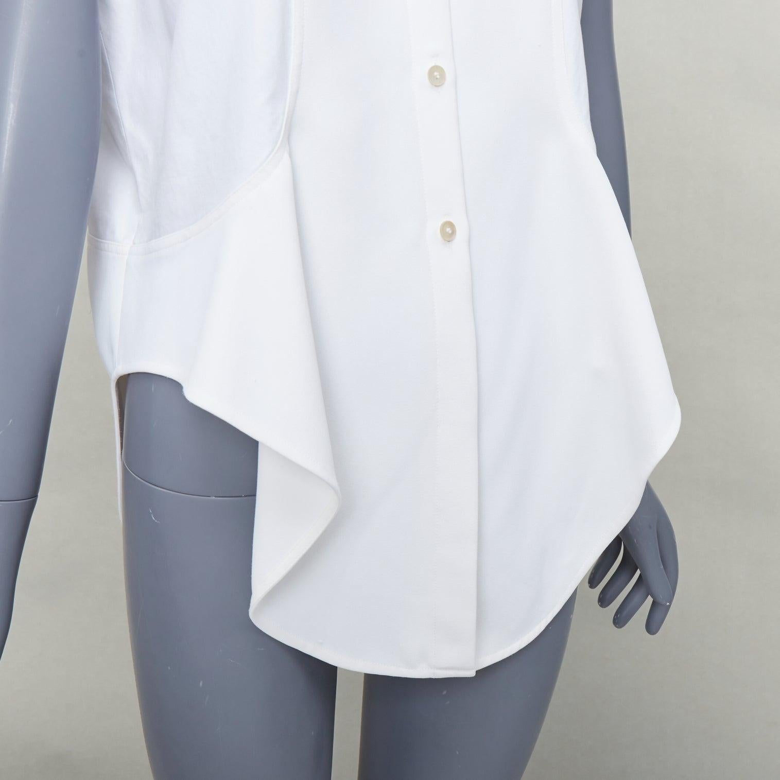 BALENCIAGA white mixed fabric drape cap sleeves collared shirt FR36 S
Reference: JACG/A00203
Brand: Balenciaga
Designer: Nicolas Ghesquiere
Material: Cotton, Fabric
Color: White
Pattern: Solid
Closure: Button
Extra Details: Mixed fabric.
Made in: