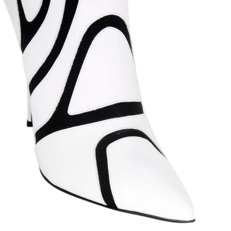 Balenciaga White Symmetric Two Tone Elastic Leather High Heels Boots/booties

Hello, ladies here is another rare creation by the world famous fashion house BALENCIAGA. Sought after by every fashion-lover! These seriously glamorous high heels are