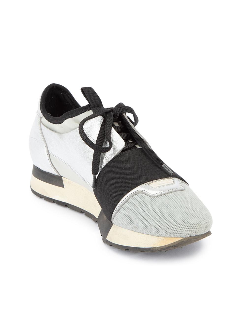 CONDITION is Very good. Minimal wear to trainers is evident. Minimal wear to the midsole which is discoloured. The knit material at the toe has some light marks and the silver material is scuffed on this used Balenciaga designer resale item. 
 
