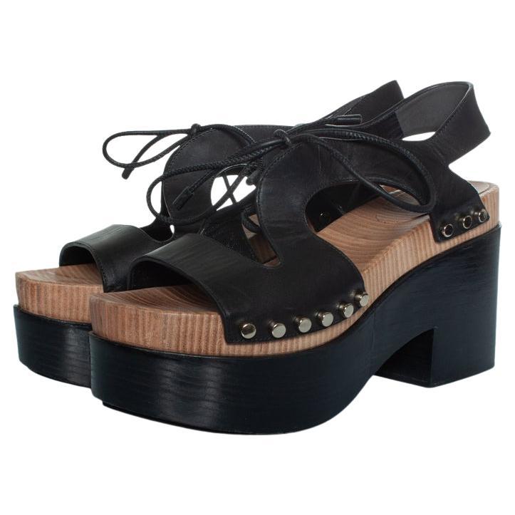 Balenciaga, Wooden and leather clog lace up sandals For Sale
