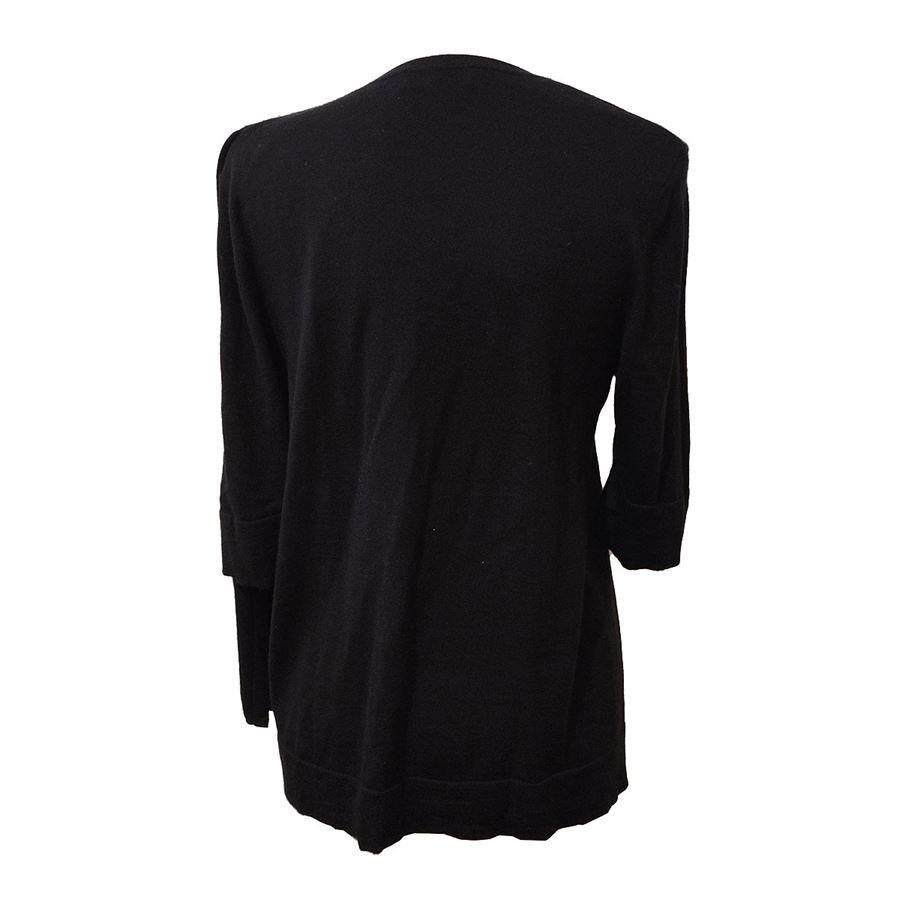 Wool Black color Short sleeves Plissé Maximum length cm 56 (22 inches) French size 40, italian 44