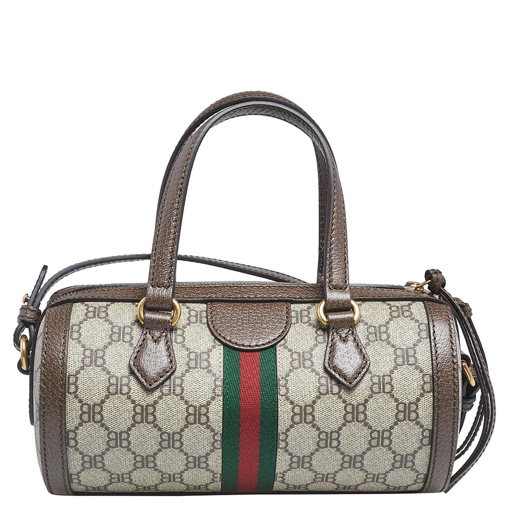 The special collaboration between Balenciaga and Gucci created fashion waves and offered us a fine collection of designs that merge the best of both brands. This Boston bag, made using coated canvas and brown leather trims, shows the Gucci monogram