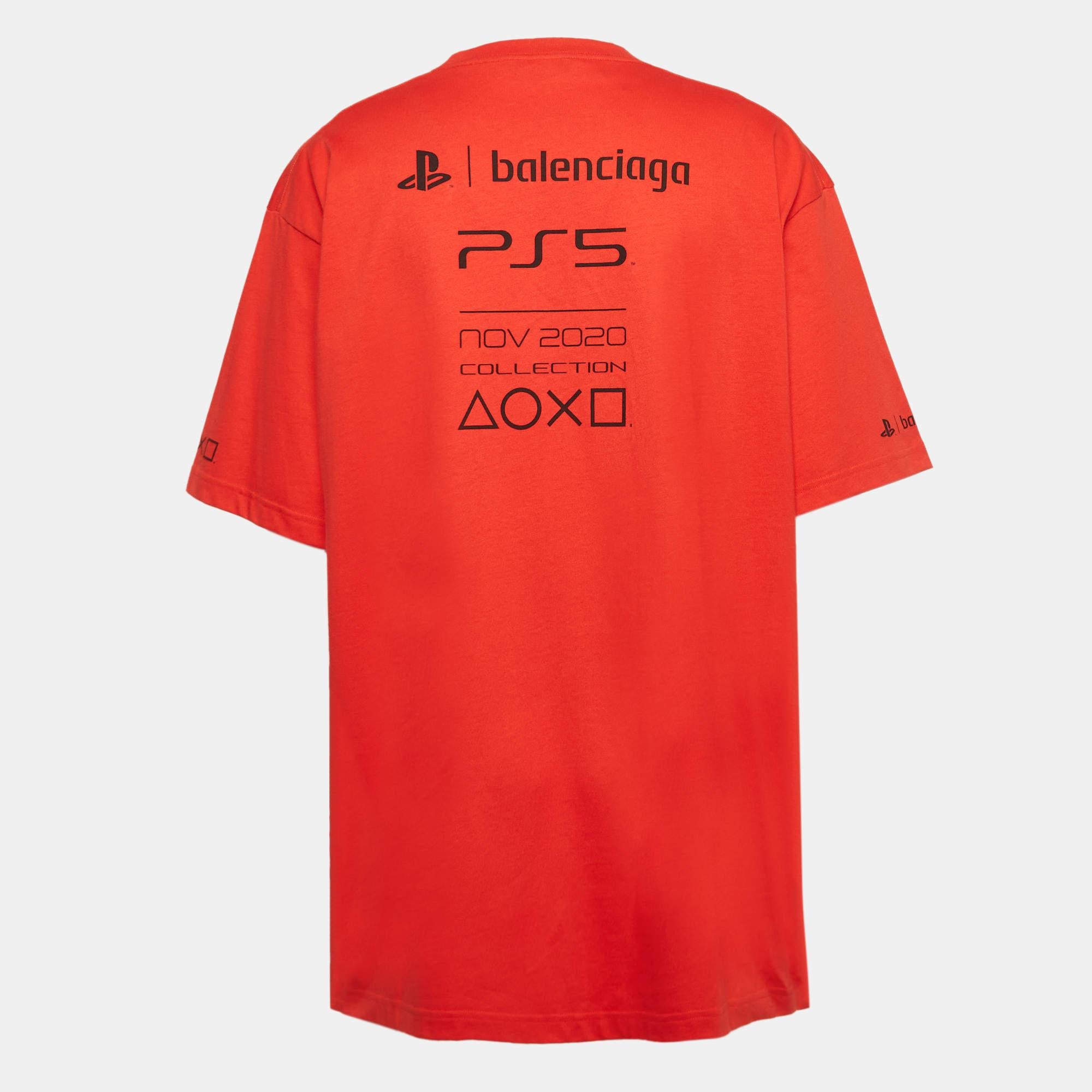The Balenciaga X PS5 T shirt merges gaming culture with high fashion. Crafted from soft breathable cotton this bold tee features a striking red print inspired by PlayStation 5. Its boxy fit ensures a relaxed yet stylish look perfect for adding a