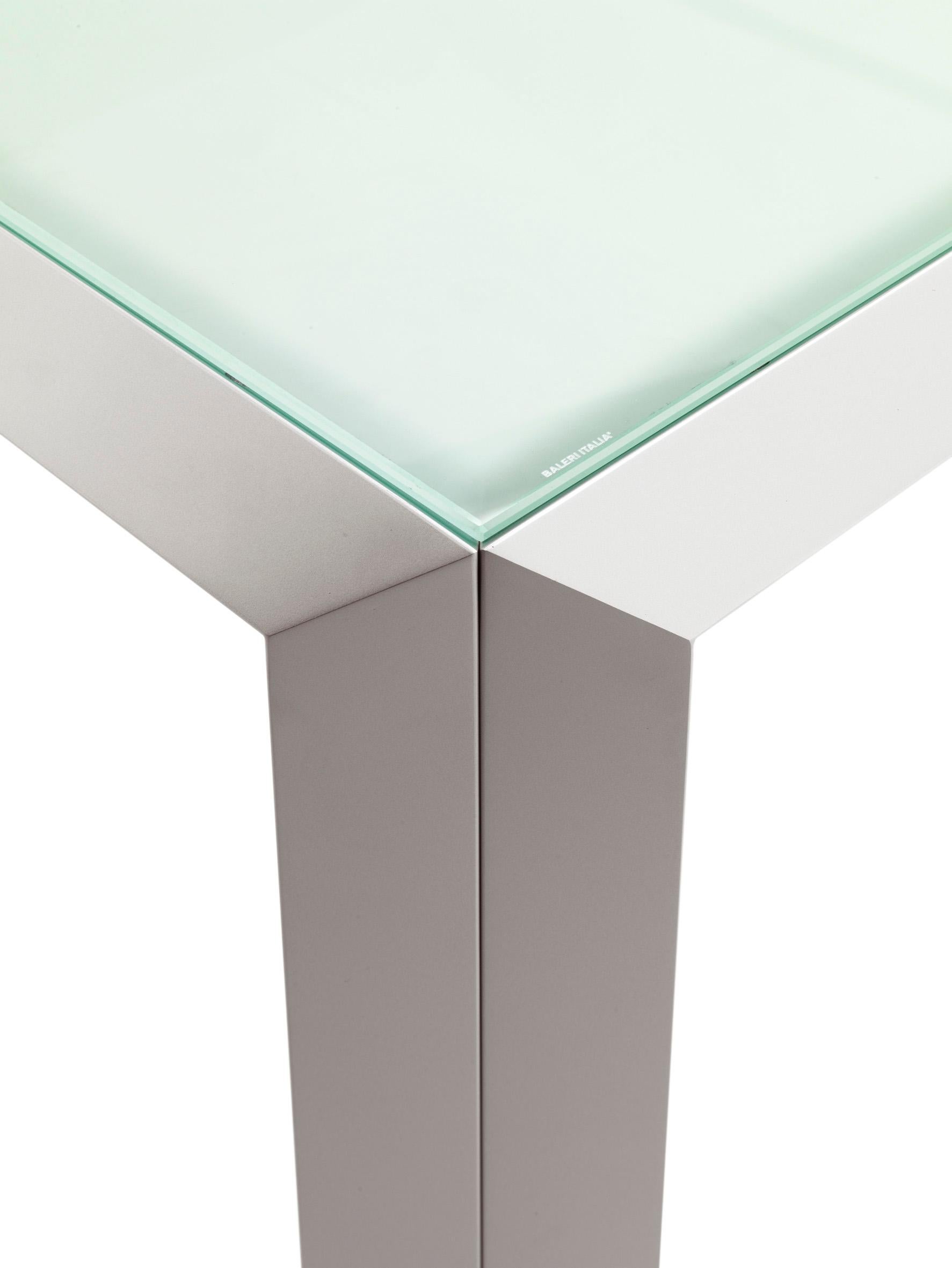 To design an essential table that stands out for its details. What might seem like a contradiction in terms - the essential and the distinctive detail - has been resolved by Mangiarotti by means of the simple combination of two “L” shaped extrusions