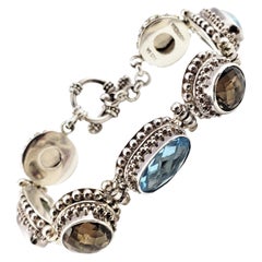 Bali Bracelet flexible à bascule souple en argent sterling avec topaze bleue et brune, Indonésie