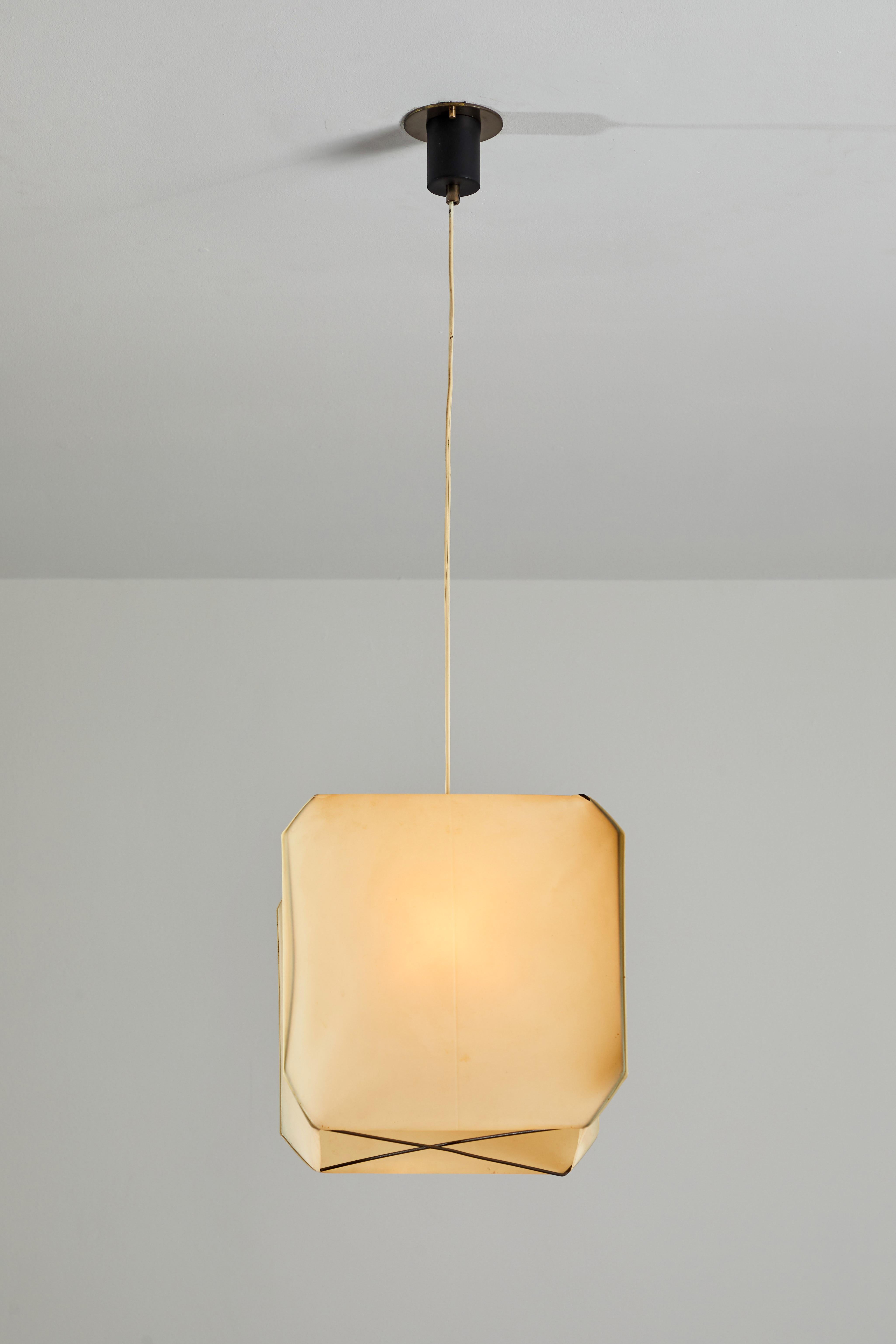 Bali suspension light by Bruno Munari for Danese Milano. Designed in Italy, 1958. Brass, metal, silk and acrylic. Wired for U.S. junction boxes. Custom brass ceiling plate. Takes one Edison 40w maximum bulb. Bulbs provided as a one time courtesy.