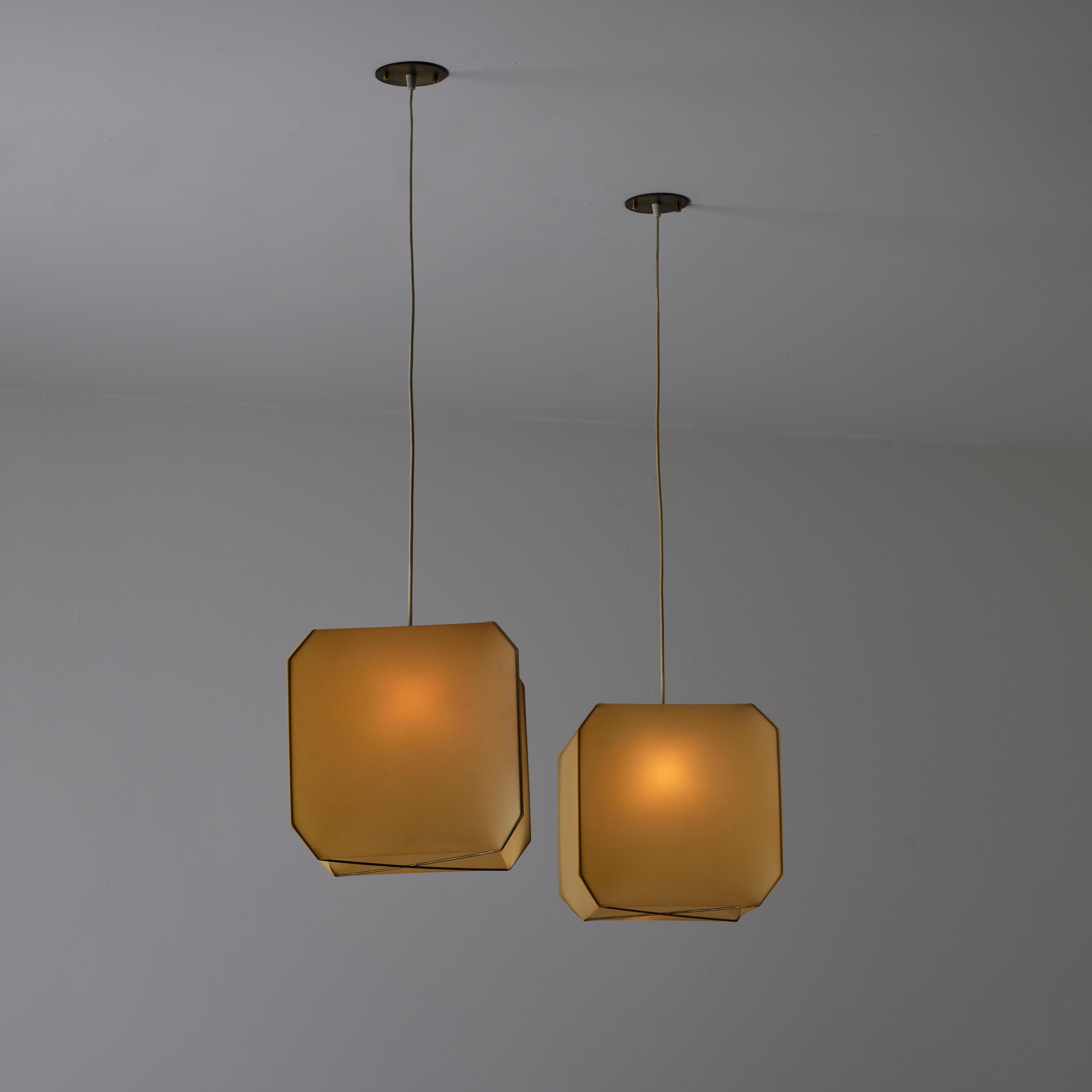 Single Bali suspension light by Bruno Munari for Danese Milano. Designed in Italy, in 1958. Brass, metal, and polymer plastic. Each lamp holds a single E27 socket type, adapted for the US. . We recommend a 40w maximum bulb or LED equivalent. Bulbs
