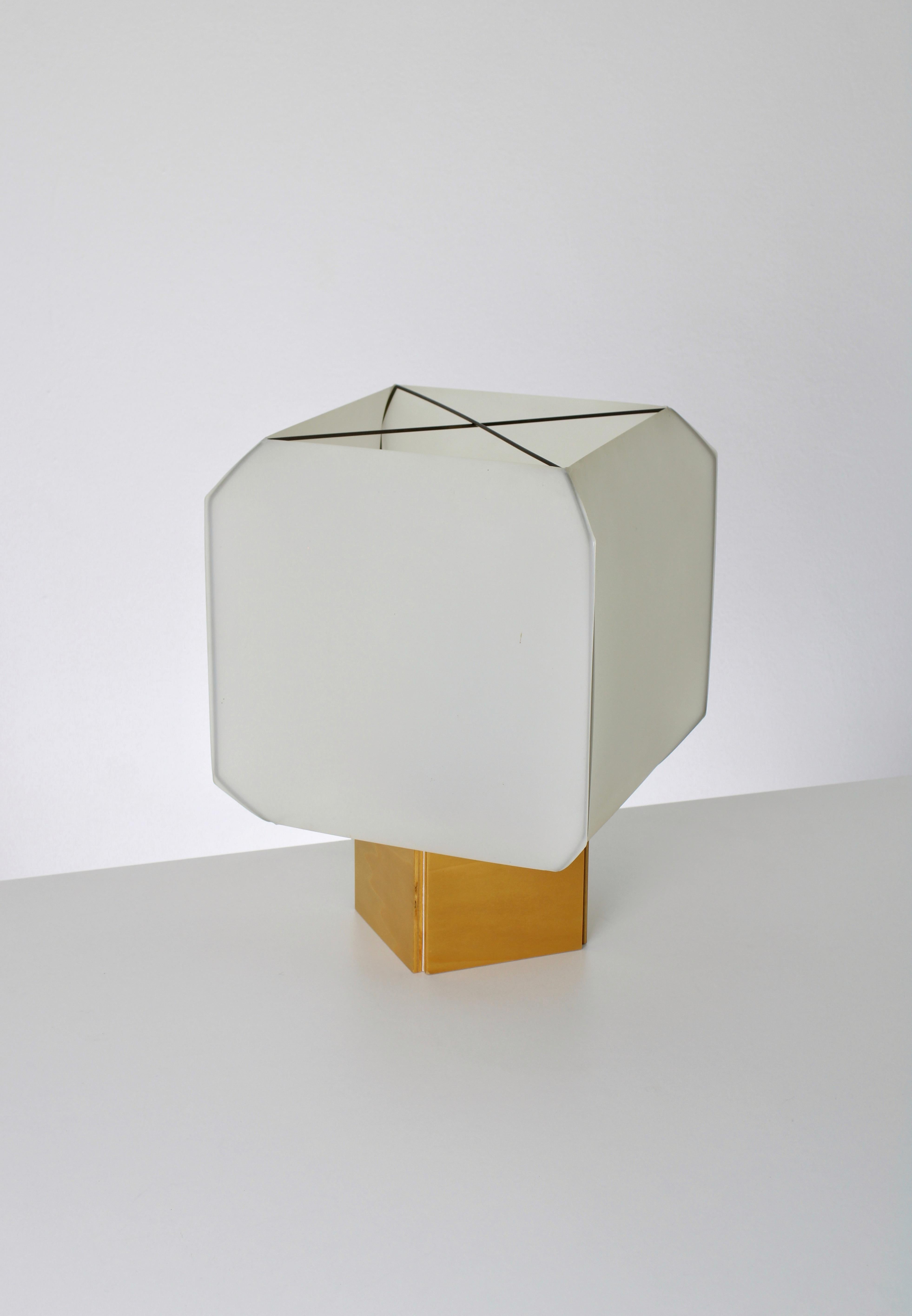 Bali table lamp, designed by Bruno Munari for Danese Milano in 1958. Made of birchwood and a fabric/plastic shade which gives a warm and diffused light. This is an exceptionally beautiful and delicate design that expresses Munari’s love for simple