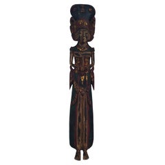 Scultura in legno di divinità buddista balinese