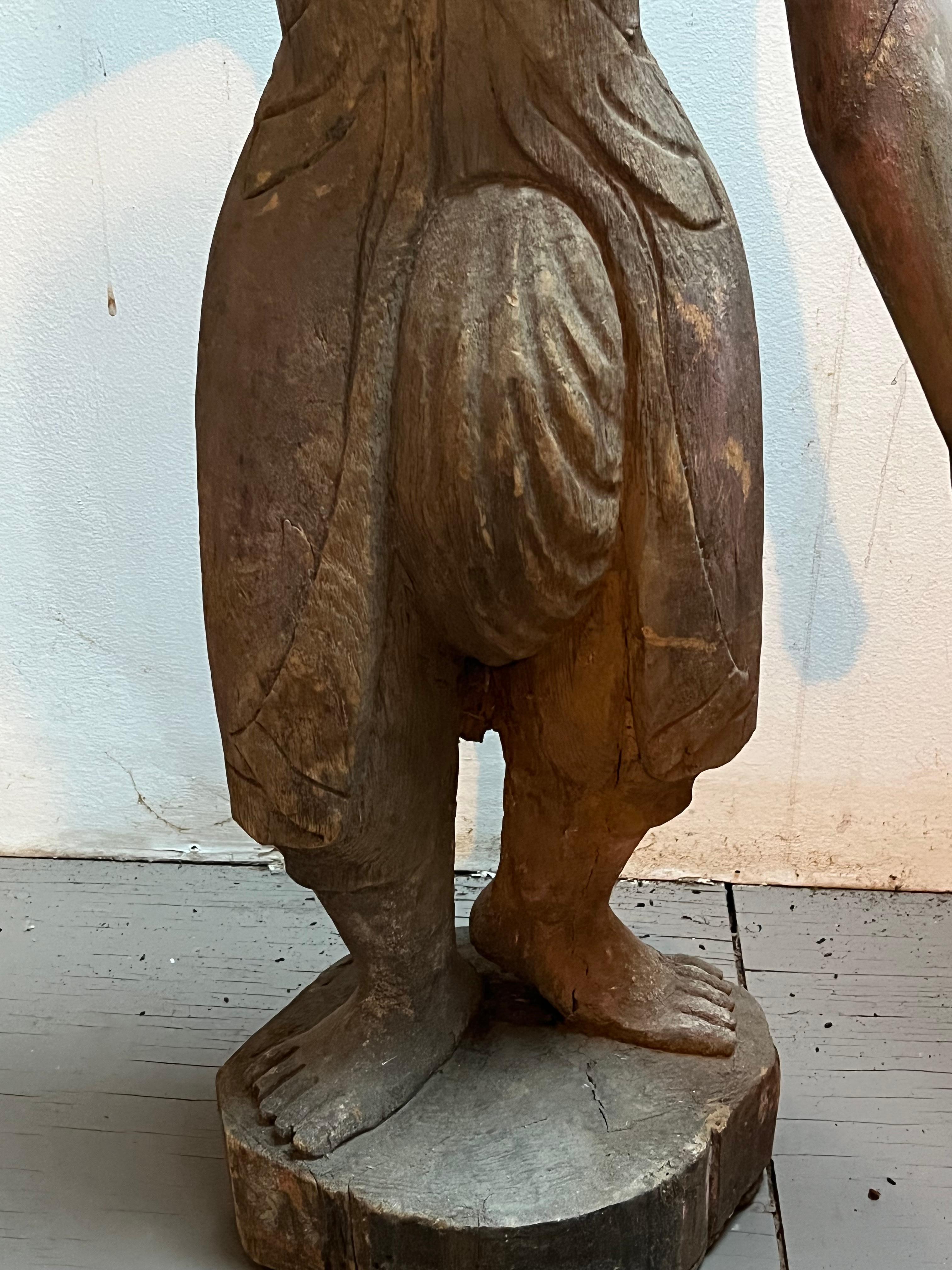 Hand-Carved Balinese Carved Wood Statue of a Warrior For Sale