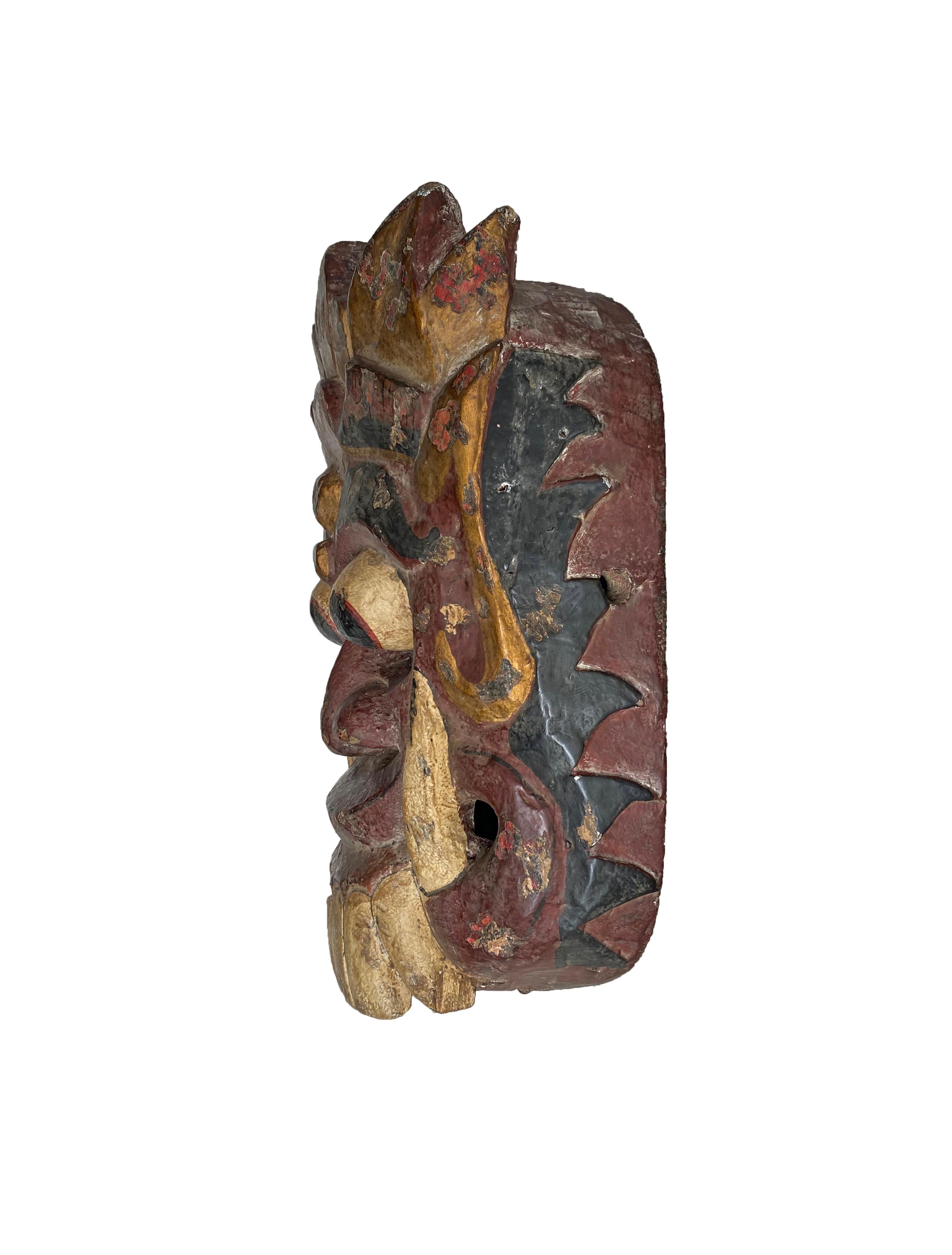 Autre Masque balinais sculpté à la main représentant la reine démocratique « Rangda » mythologique, vers 1900 en vente