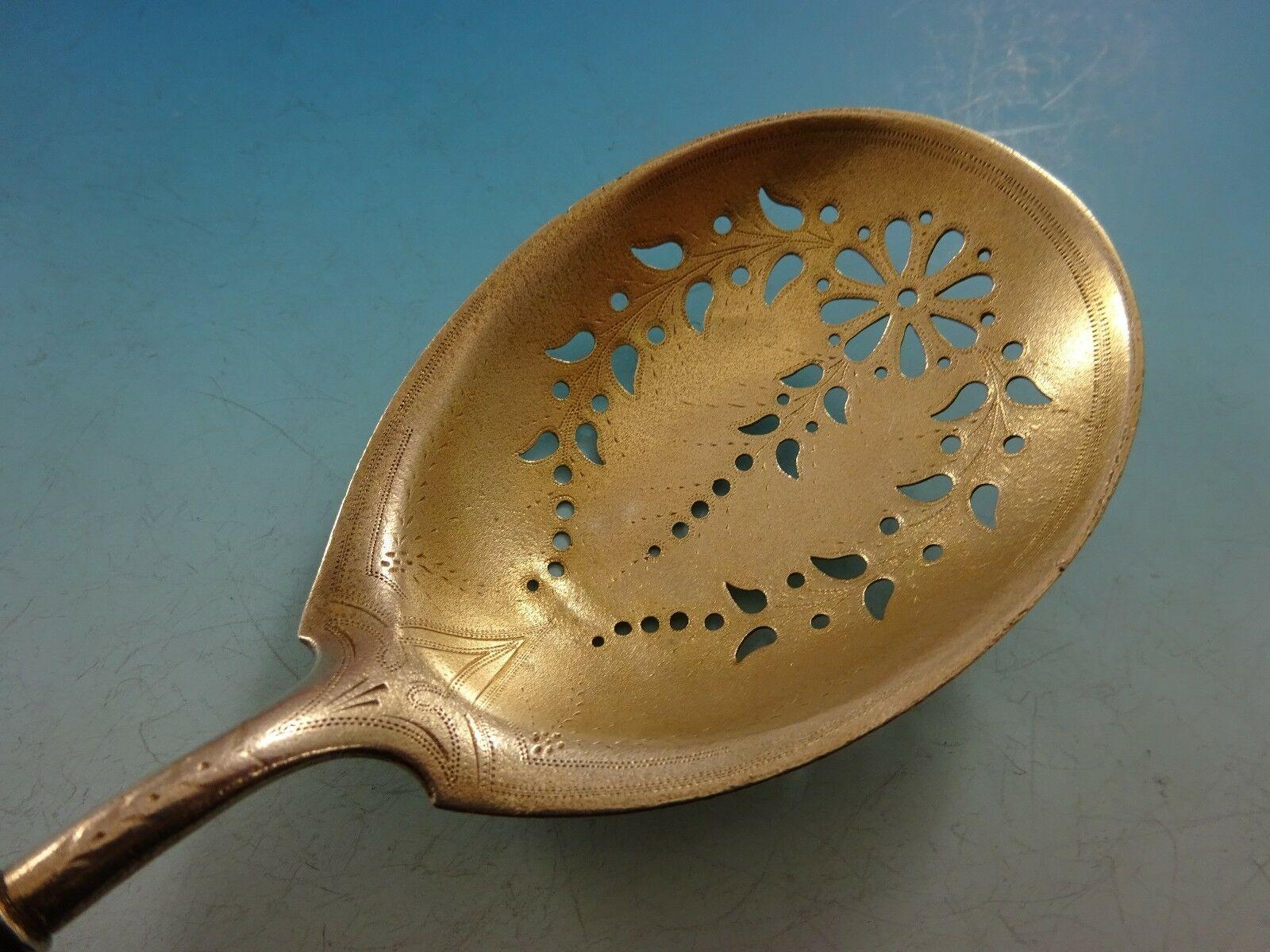 Ball end pattern #2 by Wendt

Sterling silver ice spoon, pierced, brite-cut, and gold washed 10