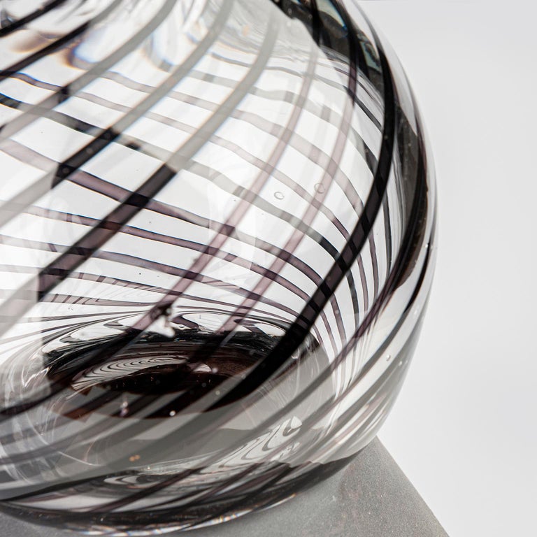 Copper glass polished and sandblasted. Transparent and black stripes attached. Hand blown in Leerdam, the Netherlands.
    