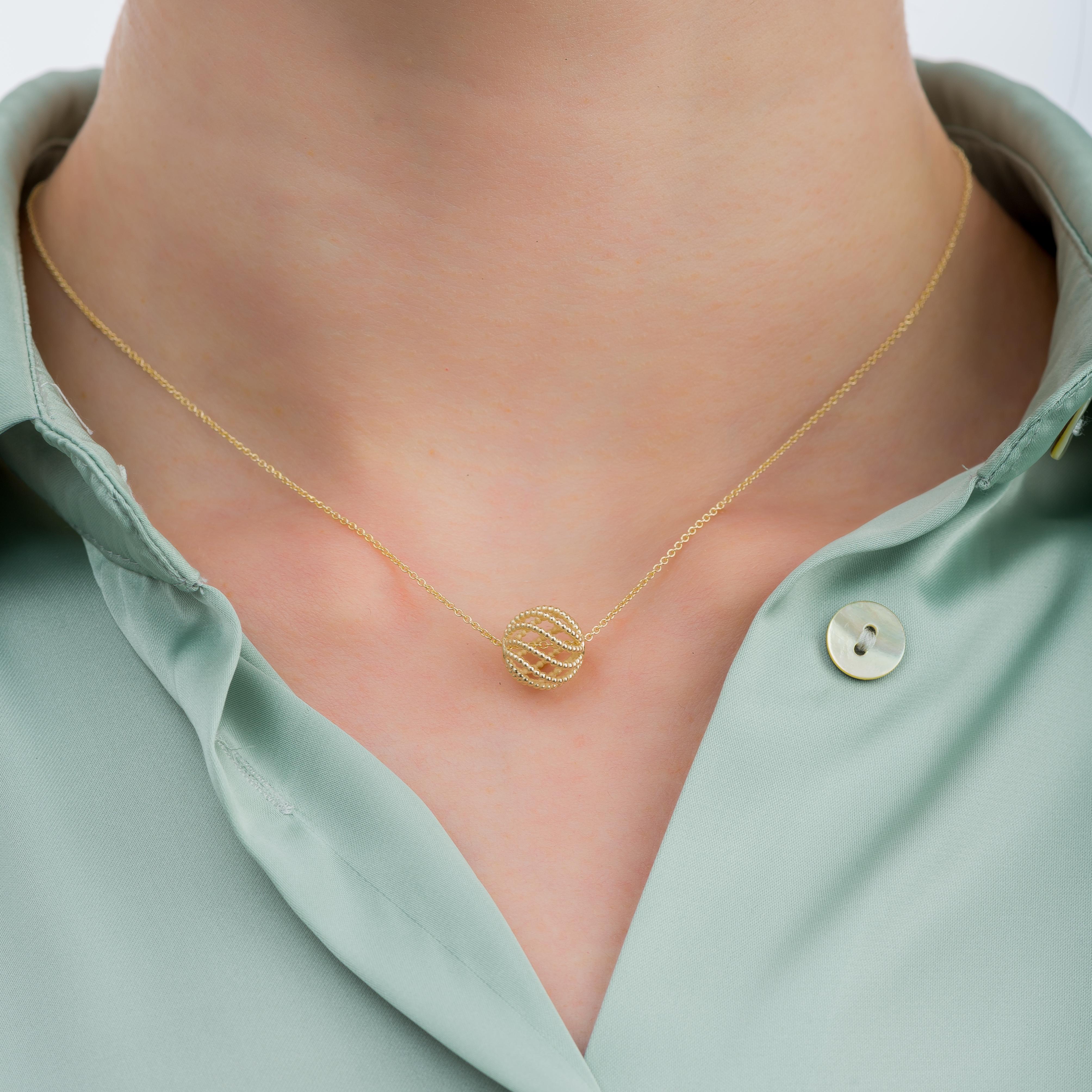 Adorn yourself with our exquisite gold open ball pendant, meticulously crafted from intricate granulations, a testament to the captivating beauty of artisan craftsmanship.

100% handmade in our workshop.

Metal: 18K Gold

Every pendant is
