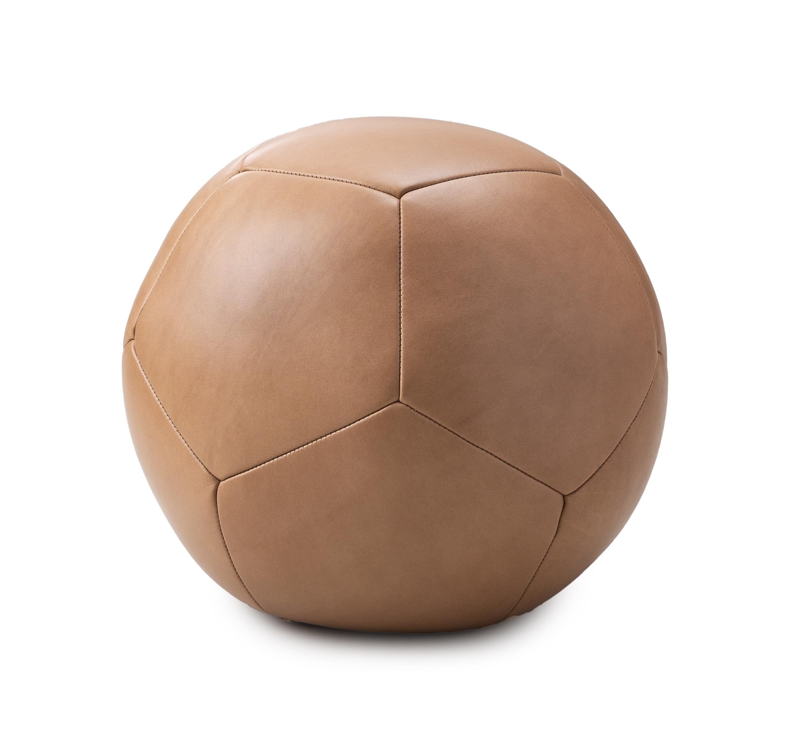 Round, sculptural and uniquely abstract, crafted with supple European leather, the Ball Ottoman has the cleanest Silhouette of our ottoman collection.
Our ottomans are hand-filled with compressed foam and finished with an elongated hand-laced