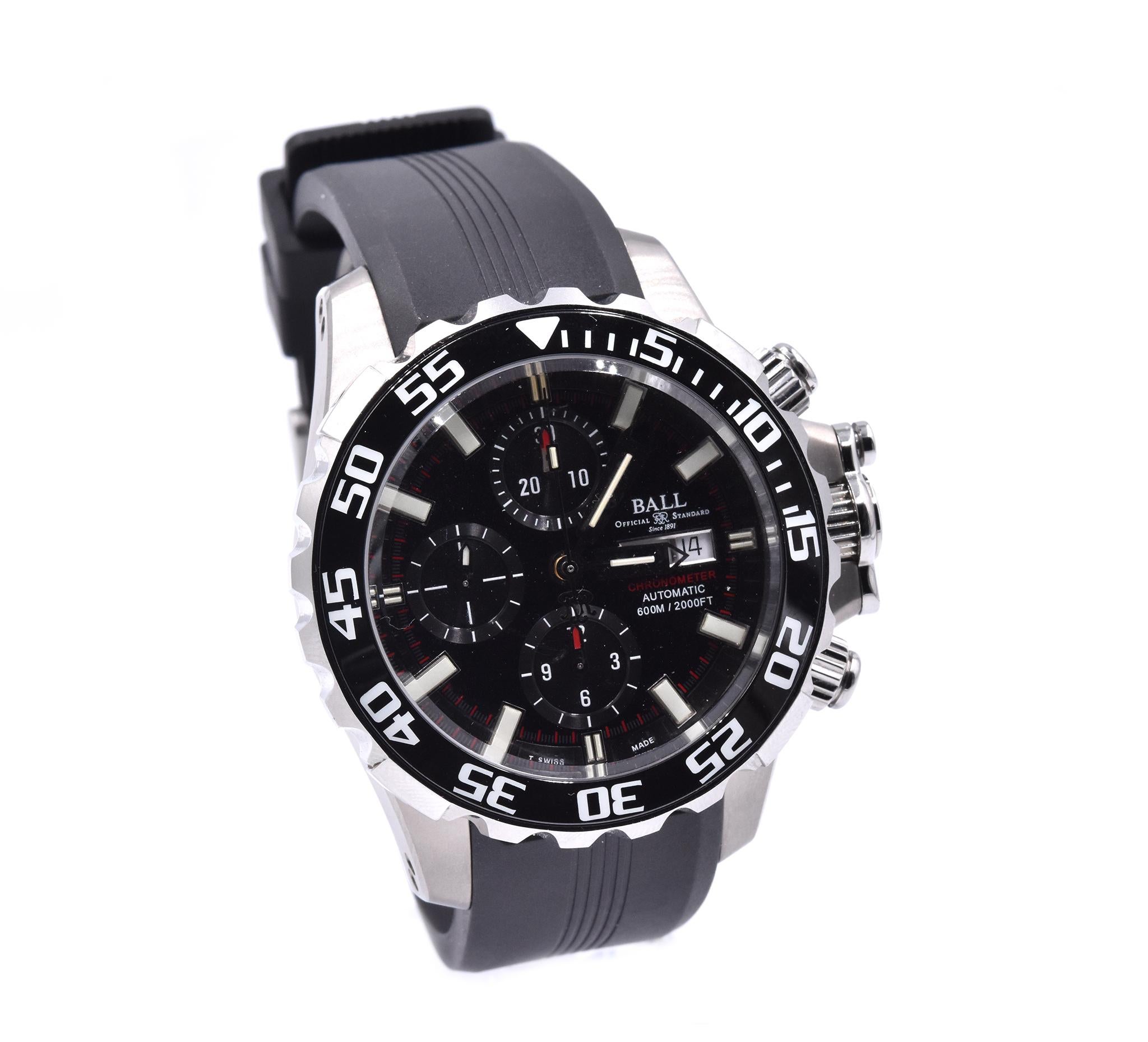 Movement: automatic 
Function:  day, date, hour, minute, second, chronograph
Case: 42mm titanium case, anti-reflective sapphire crystal, solid case back, screw-down crown
Dial: black stick chronograph dial
Serial: 3900XXX
Reference: DC-3026A

Comes