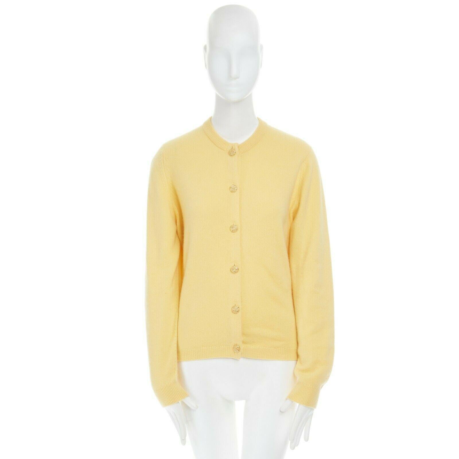 yellow cardigan sweater
