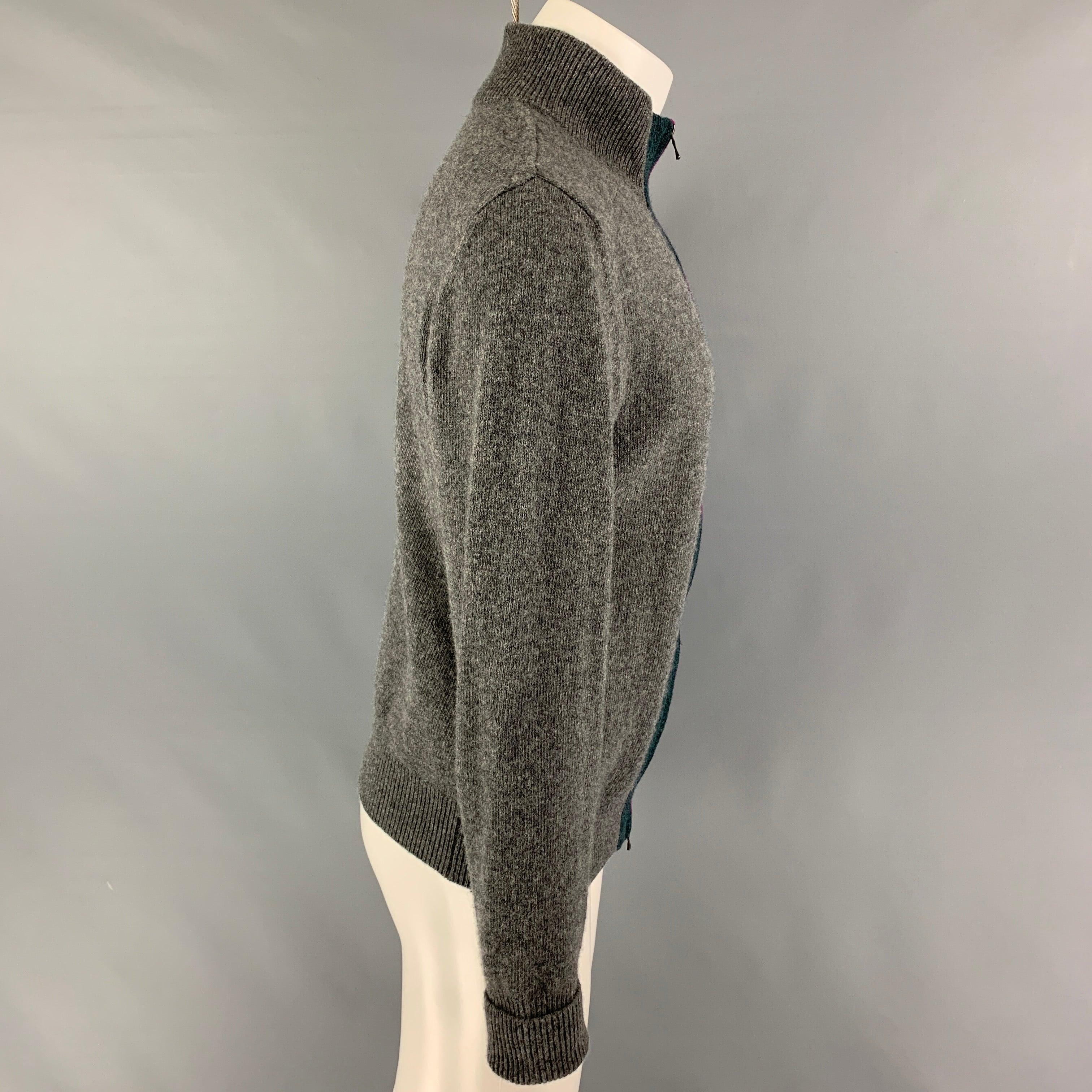 BALLANTYNE cardigan comes in a grey wool featuring a fuchsia & navy color block stripe design, high collar, and a full zip up closure. Made in Italy. Very Good
Pre-Owned Condition.  

Marked:   50 

Measurements: 
 
Shoulder:
17.5 inches  Chest:
40