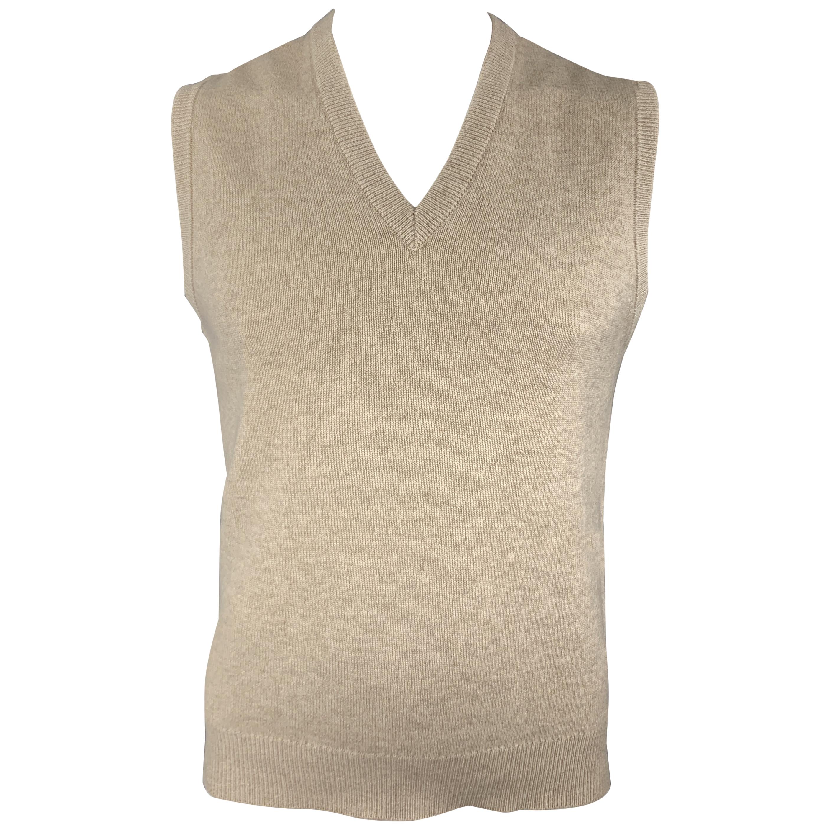 beige sweater vest