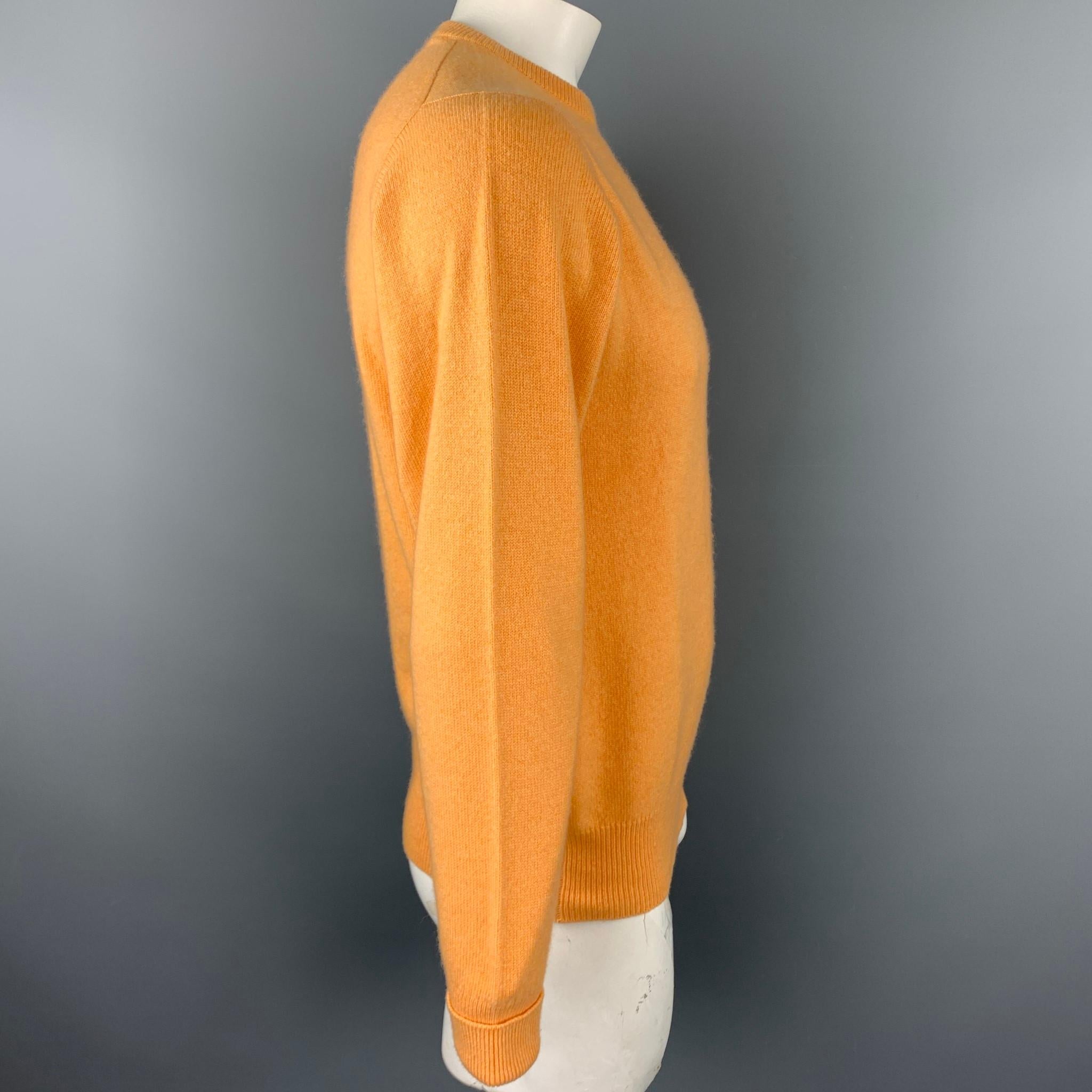 BALLANTYNE sweater comes in a peach cashmere featuring a ribbed crew-neck.

Very Good Pre-Owned Condition.
Marked: 44

Measurements:

Shoulder: 17 in. 
Chest: 44 in. 
Sleeve: 29 in. 
Length: 26 in. 
