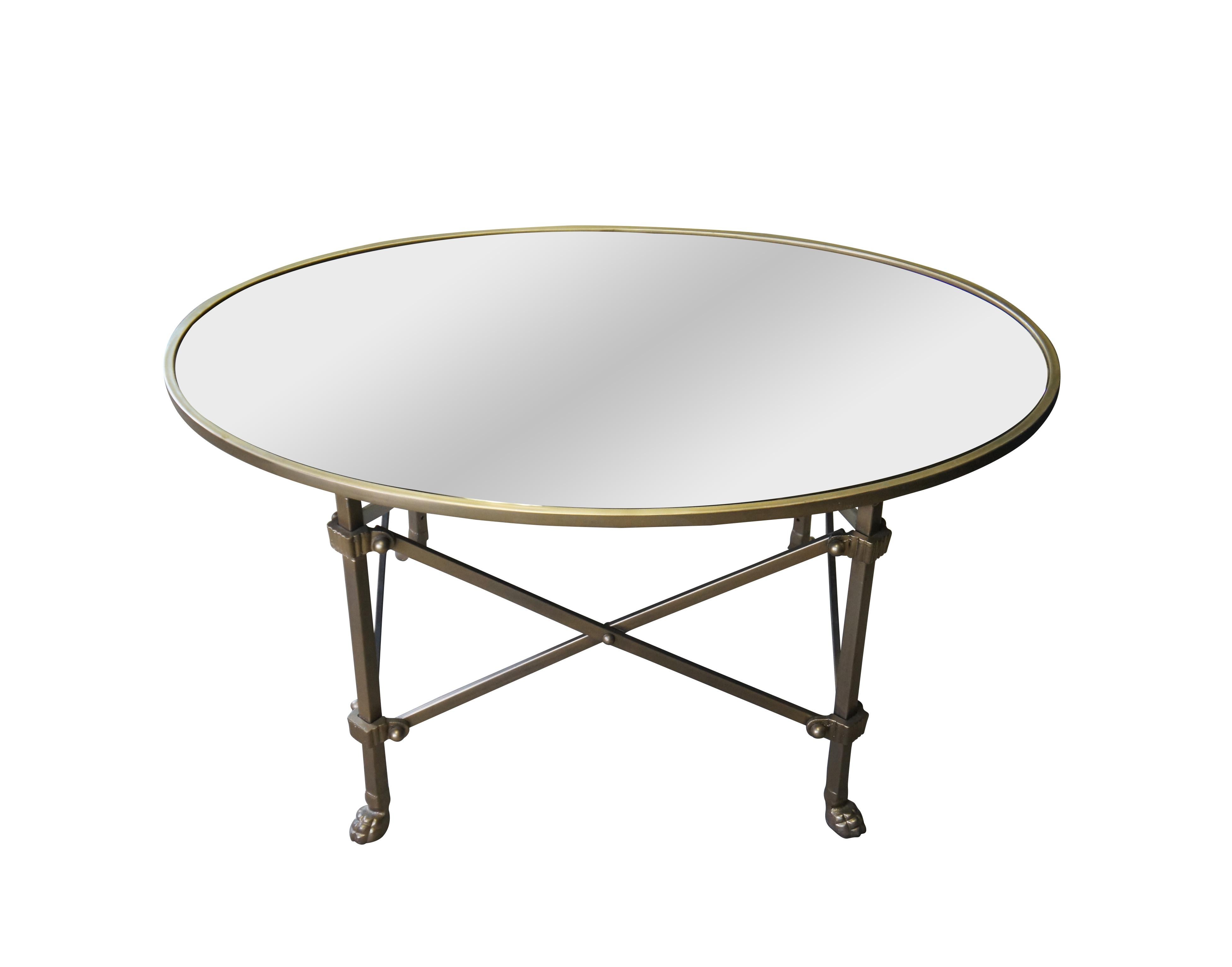 Vintage Ballard Designs Olivia cocktail table. A stylish update on the classic French gueridon, this oval coffee table is crafted of metal with classic claw-footed legs, 