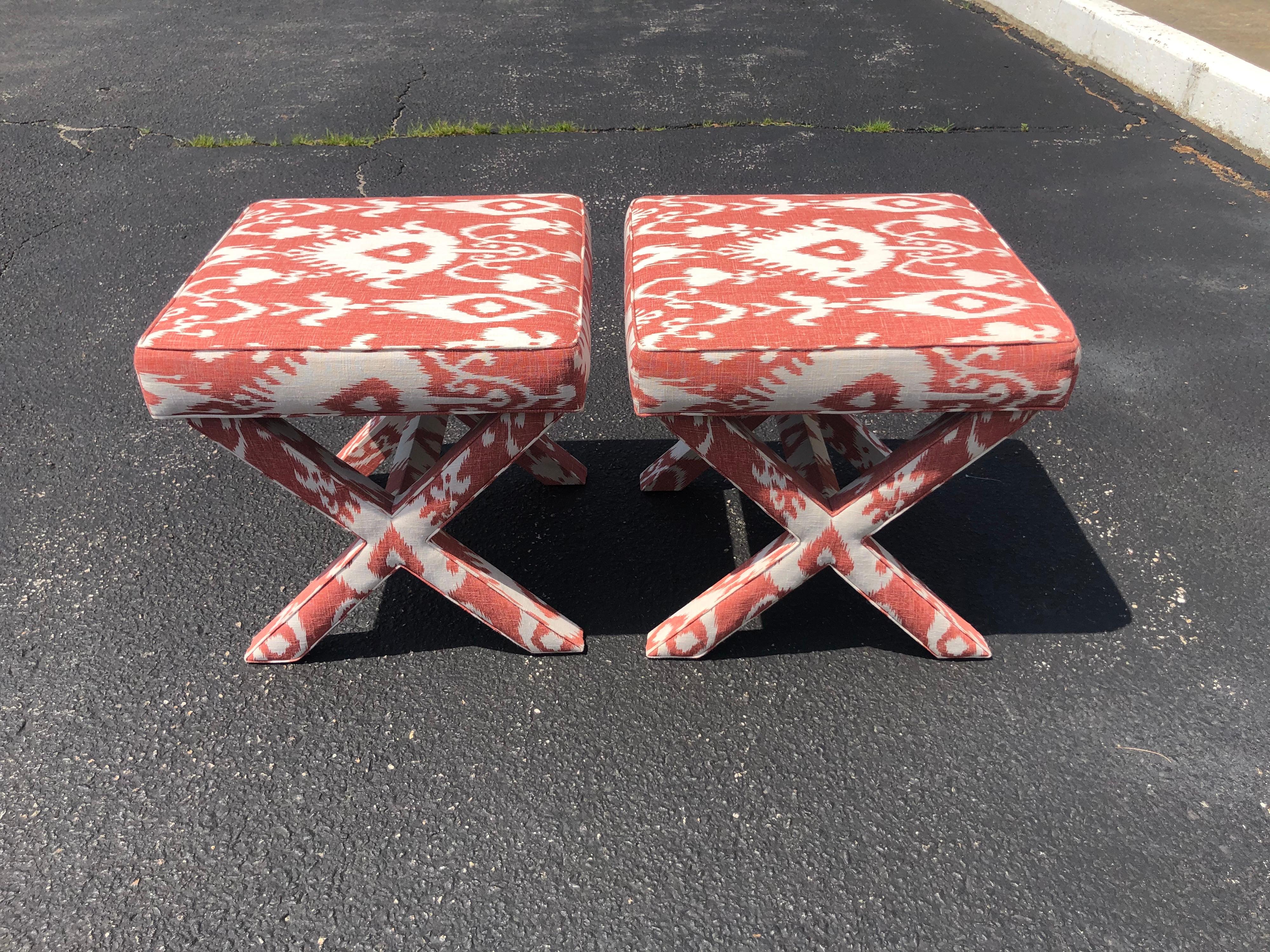 Ballard design pair of X base ottomans or stools. Oversized and taller in height. Can be used as side tables or coffee tables. Mint condition.