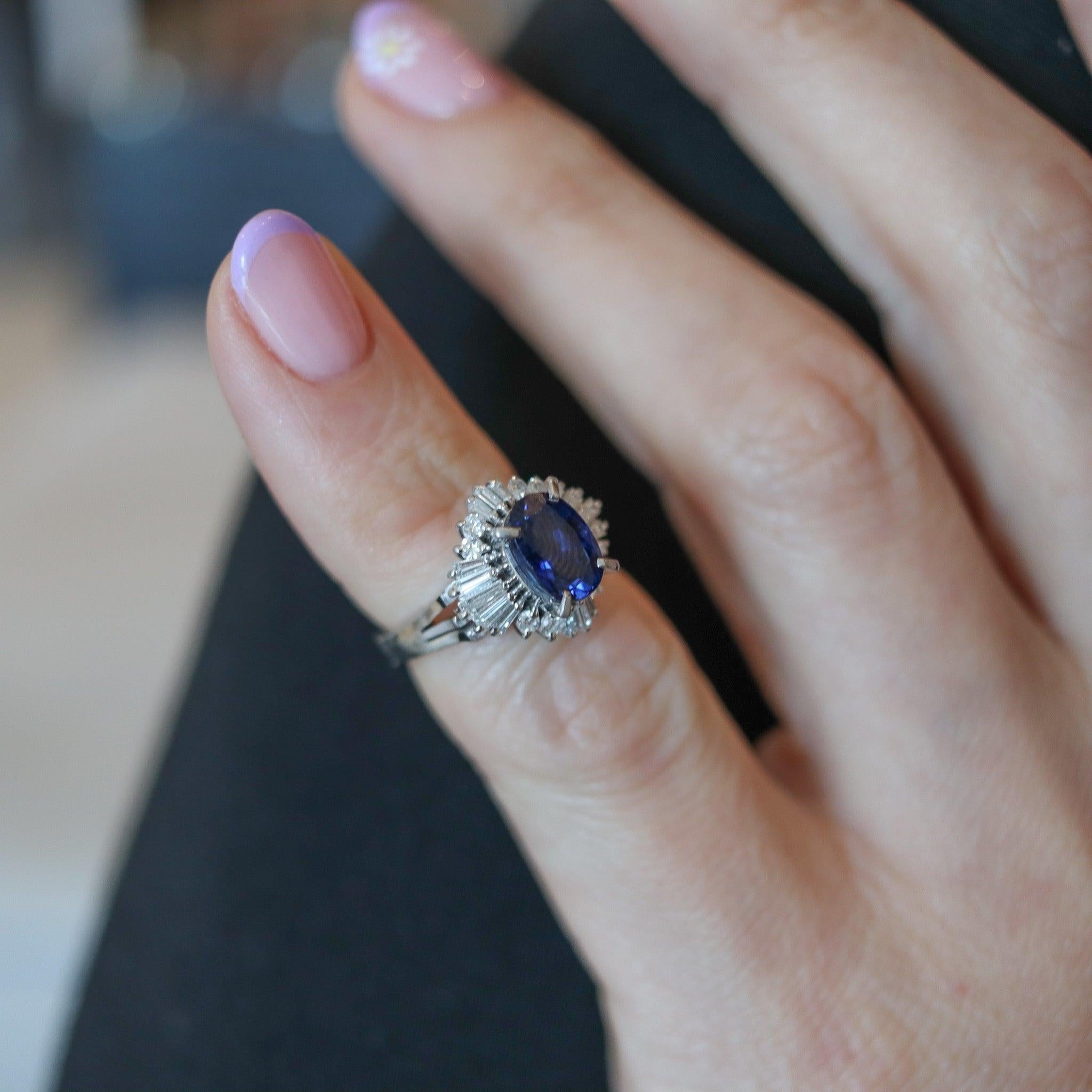 A classic ballerina ring with gemstones.

This is a beautiful contemporary ring, crafted in the shape of a classic ballerina in solid .900/.999 platinum with high polished finish. The central upper part is embellished with twenty-five earth-mined