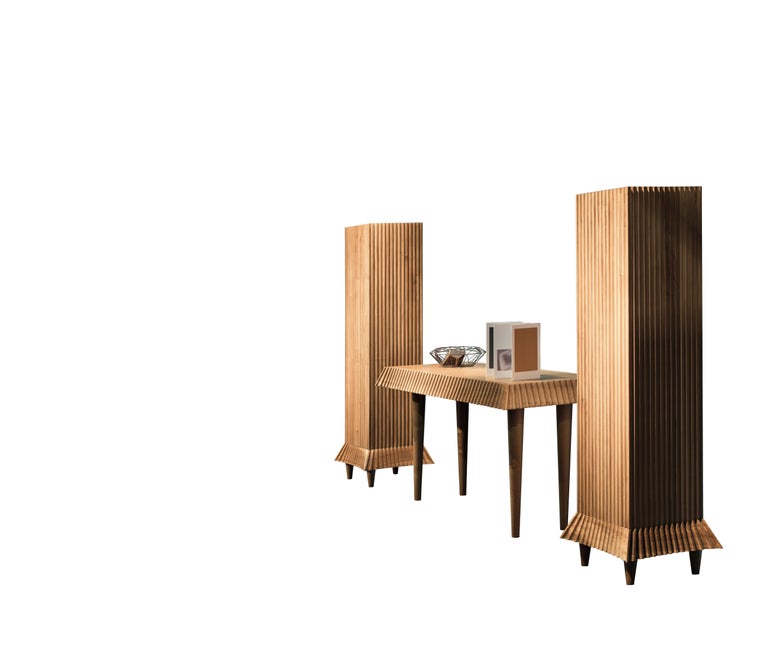 Console table designed by Ugo La Pietra, all made of solid walnut. Finish: natural honey walnut. Plissè / Pleated effect.
