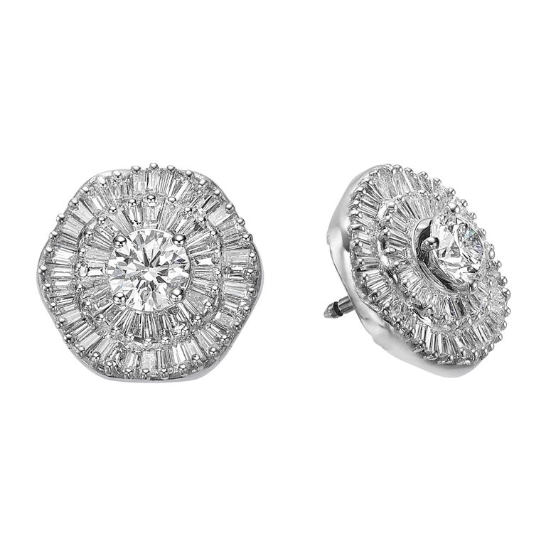 Interchangeable Double Halo Ballerina style pair of diamond earrings 4.66 Carat total diamond weight. 
Earrings are made with detailed craftsmanship and are set with high quality GIA certified diamonds: E / VVS  & E / VS1 .  
Our pair of handcrafted