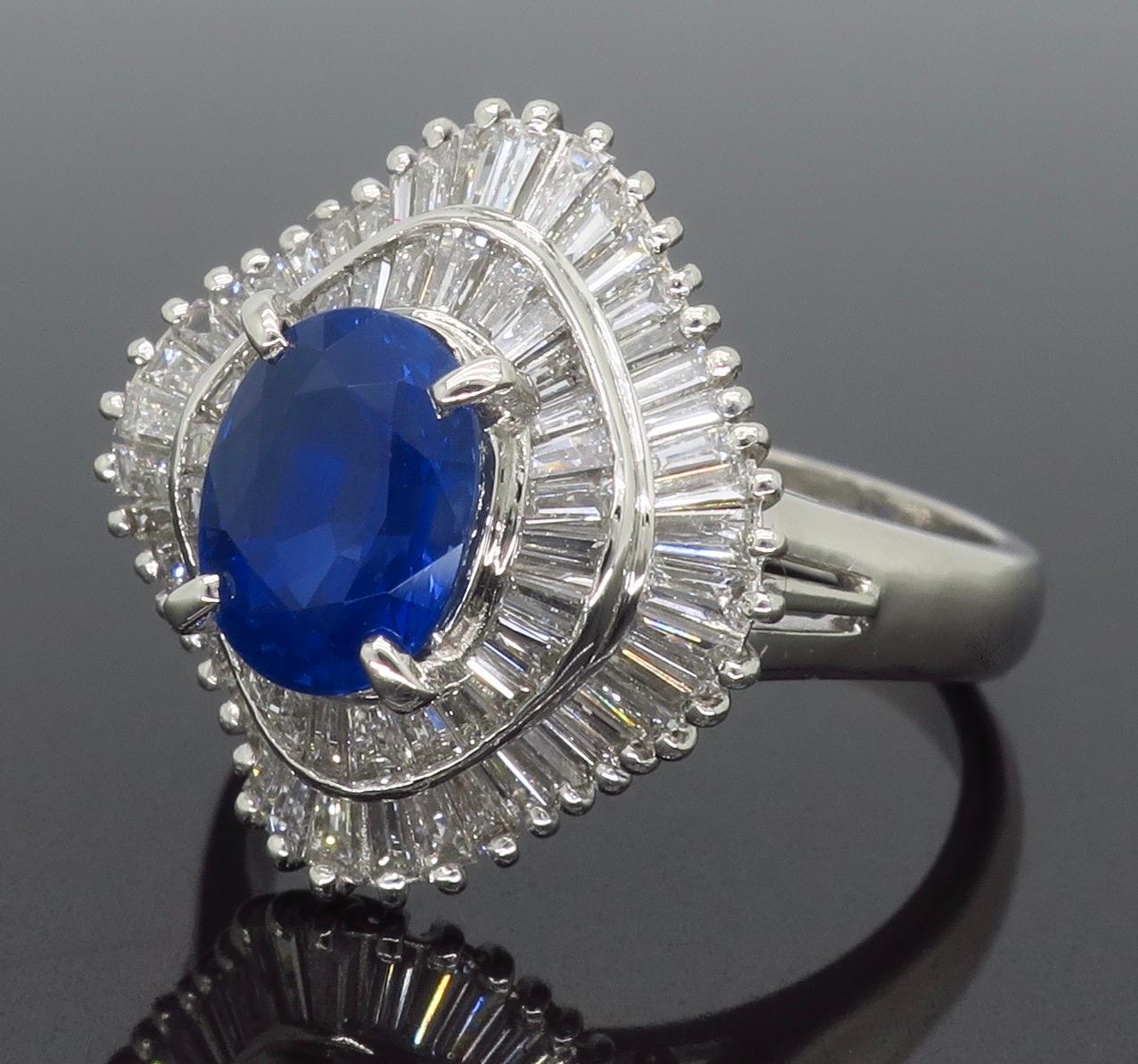 Oval Cut Ballerina Style Blue Sapphire and Diamond Cocktail Ring in Platinum