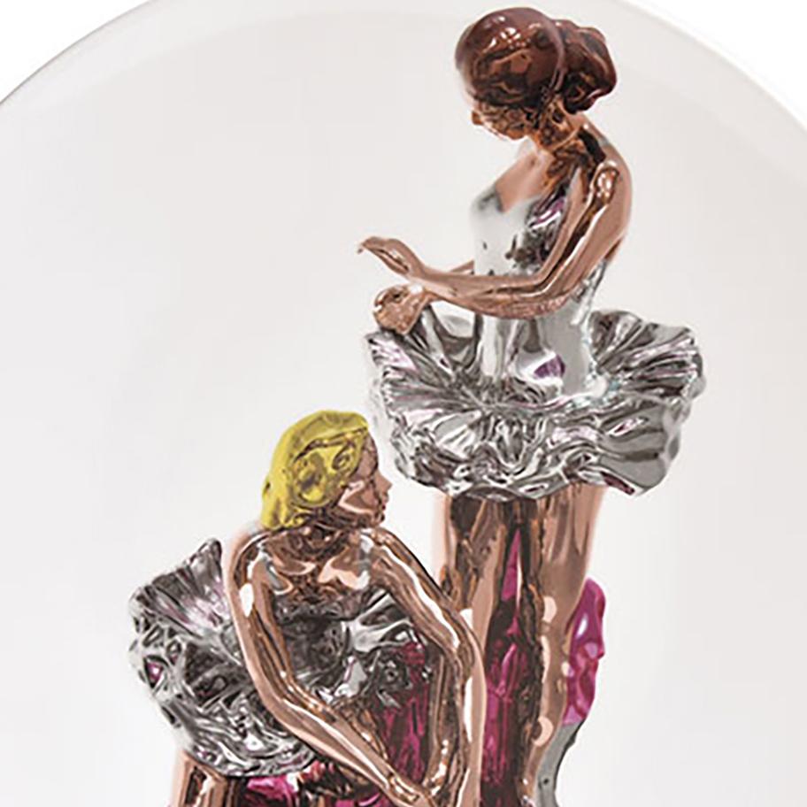 The Ballerinas coupe service plate designed by Jeff Koons features an image of his sculpture Ballerinas (2010–14) from the iconic Antiquity series. Inspired by a small porcelain figurine of two dancers, the artist transformed the ready-made into a