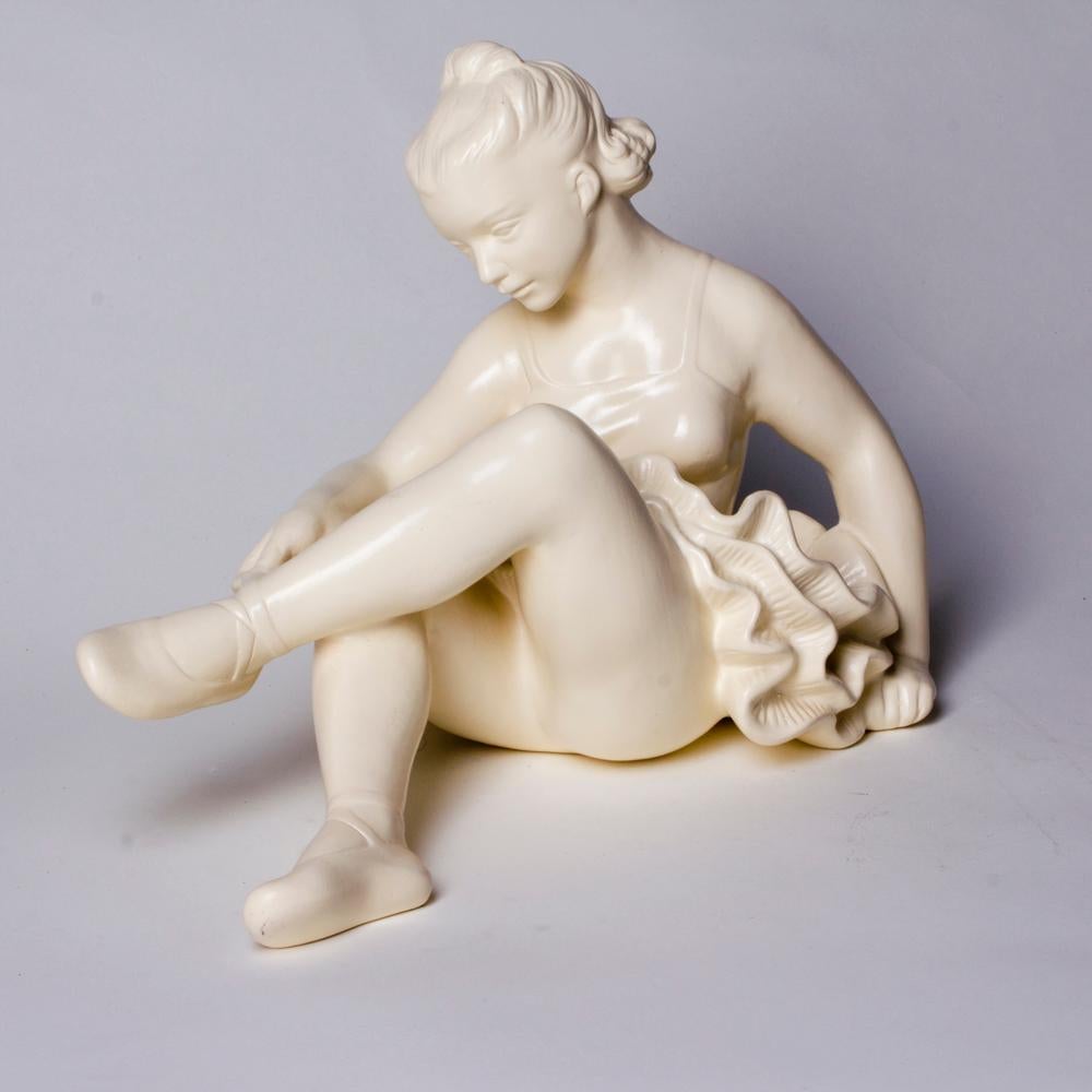 Beautiful and elegant sculpture of a ballet dancer sitting down. The item comes from Czechoslovakia and was produced in 1960s. It is made of plaster with shiny finish. Very good condition without wear. Beautiful item with lots of elegant details.