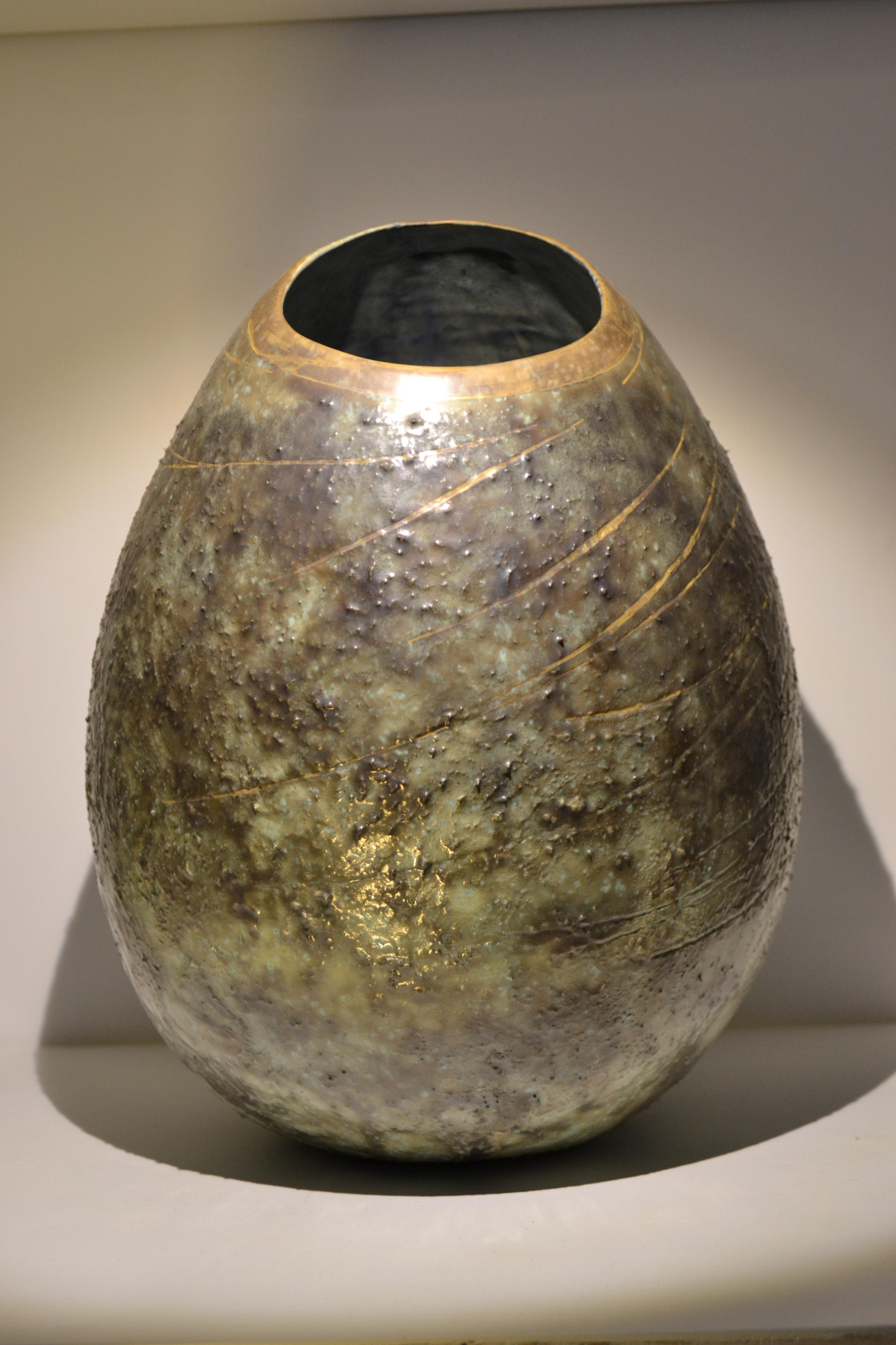 Handmade white clay vase and second-fired green glaze ceramics with brown mottling and oxide. Decorated with engravings and collar in 24k matt gold in 3rd fire.